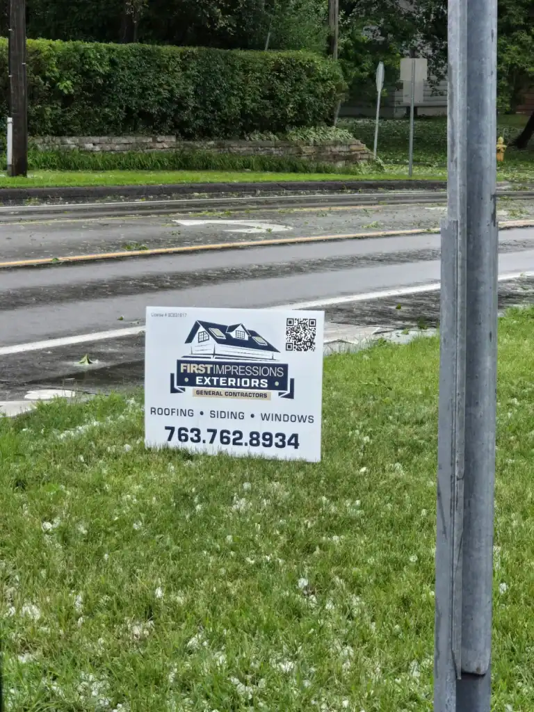 First Impressions yard sign after hail storm