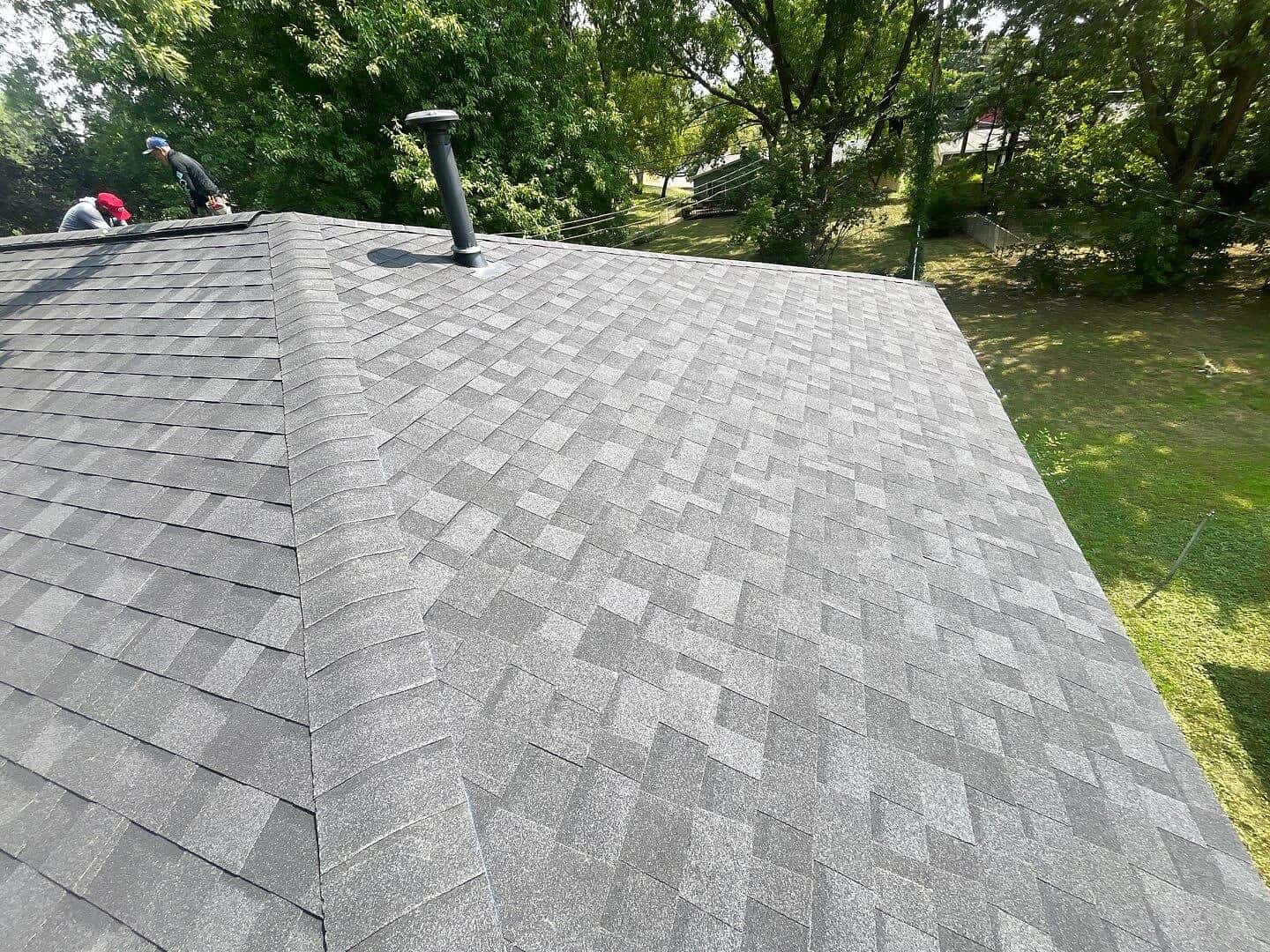 Finished Duration FLEX Onyx Black shingle roof in Crystal, MN