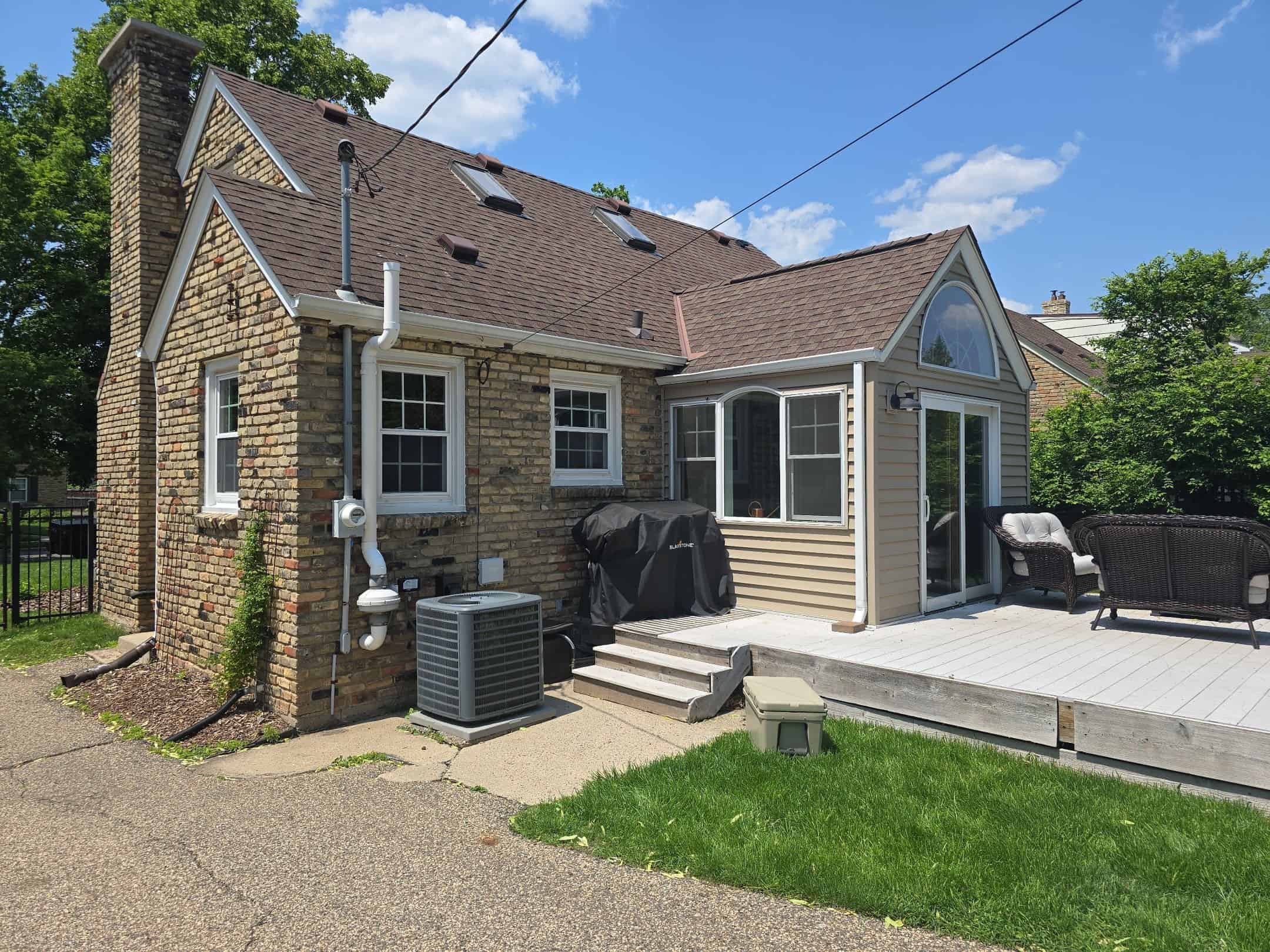Rear downspouts and gutters on a St. Louis Park, MN home