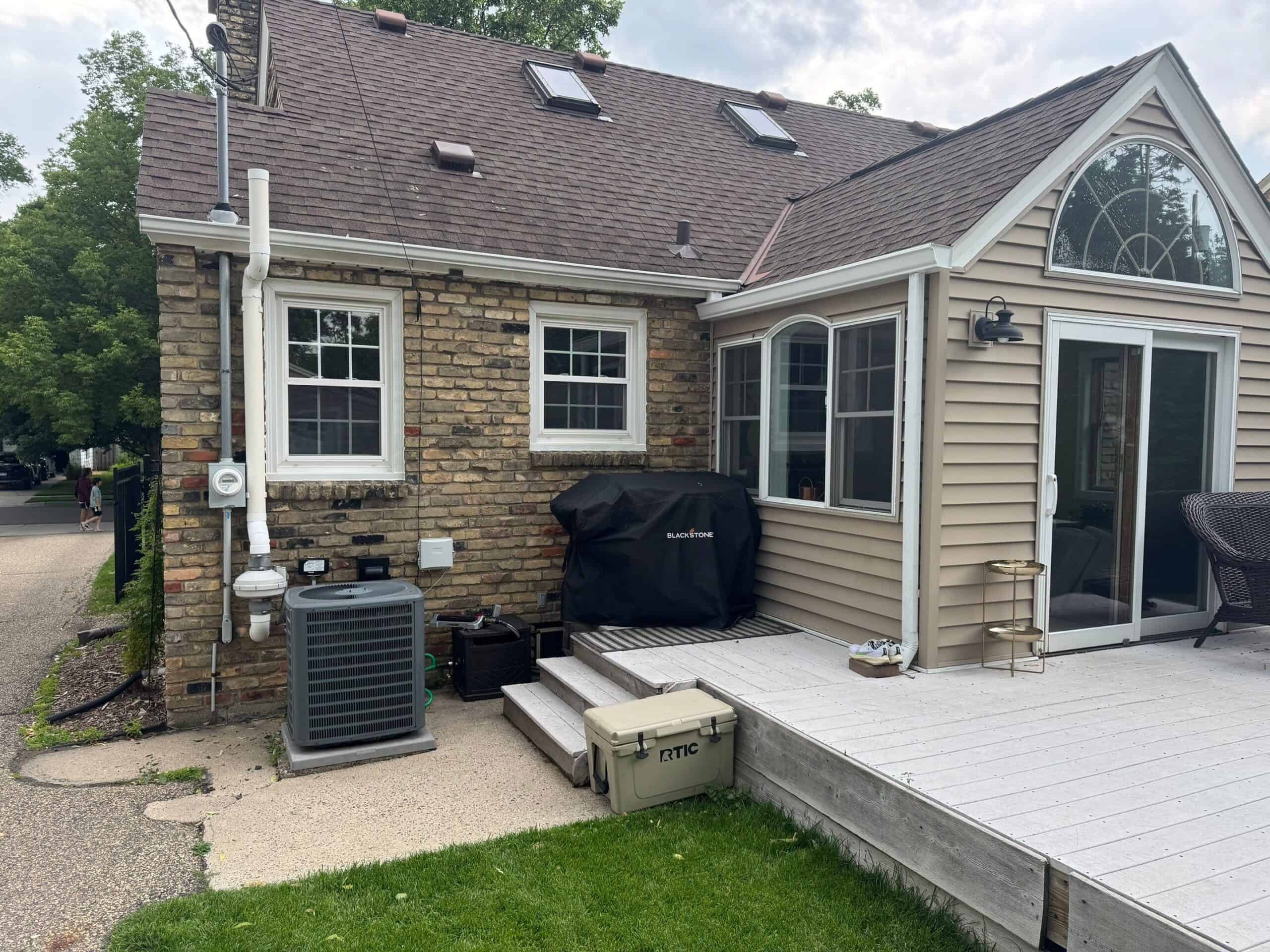 Back of a St. Louis Park, MN home with new gutters and downspouts