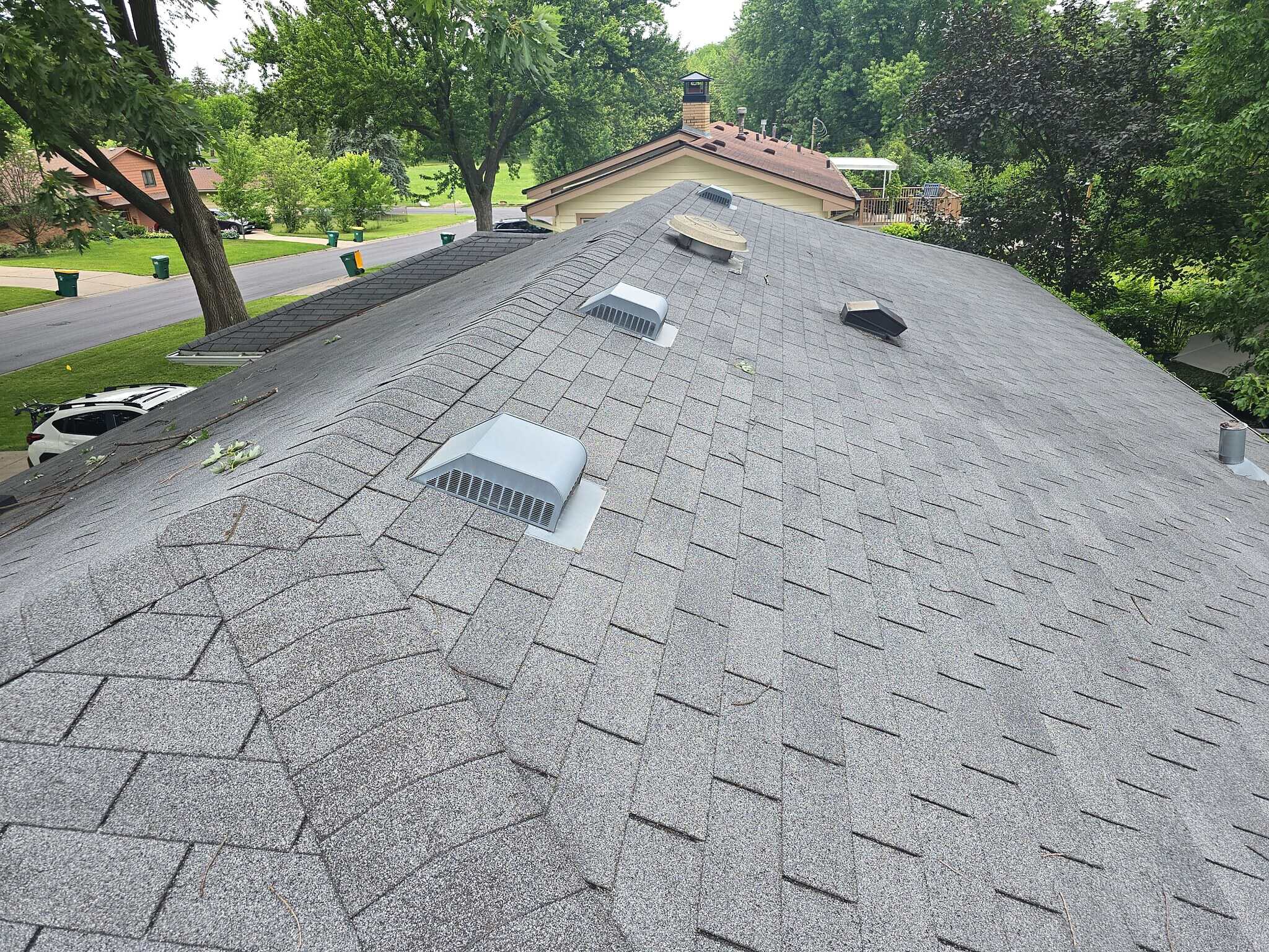 Old roof with box vents before replacement in Crystal, MN