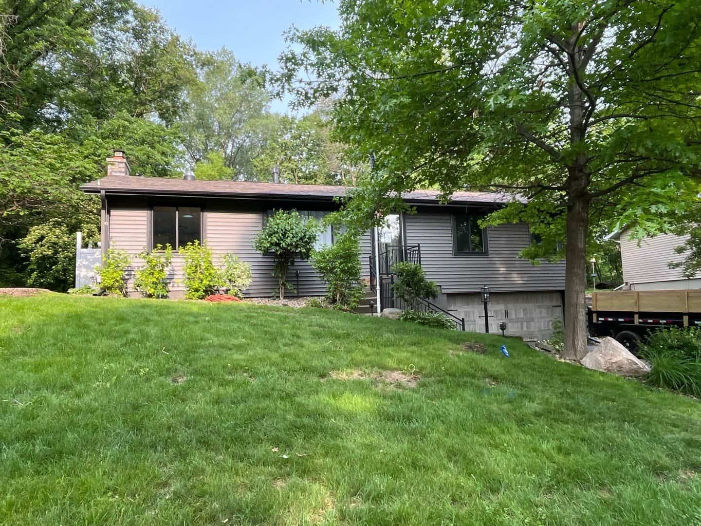 New Smoke color siding and black soffit on a Burnsville, MN home