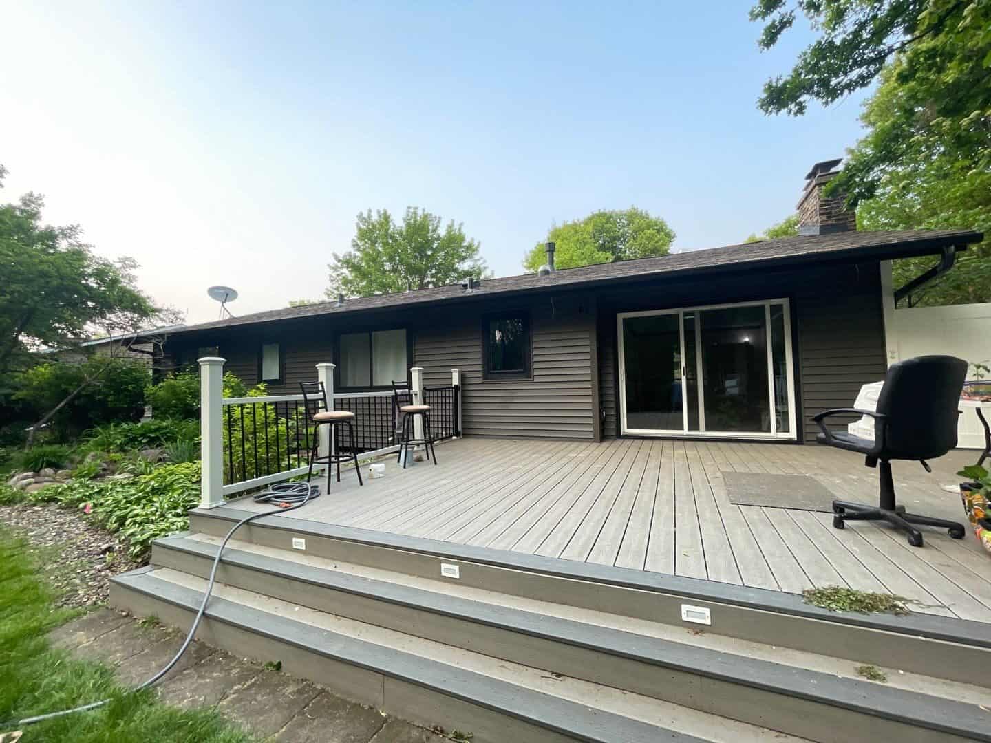 Rear deck and new Alside Charter Oak siding on a Burnsville, MN home