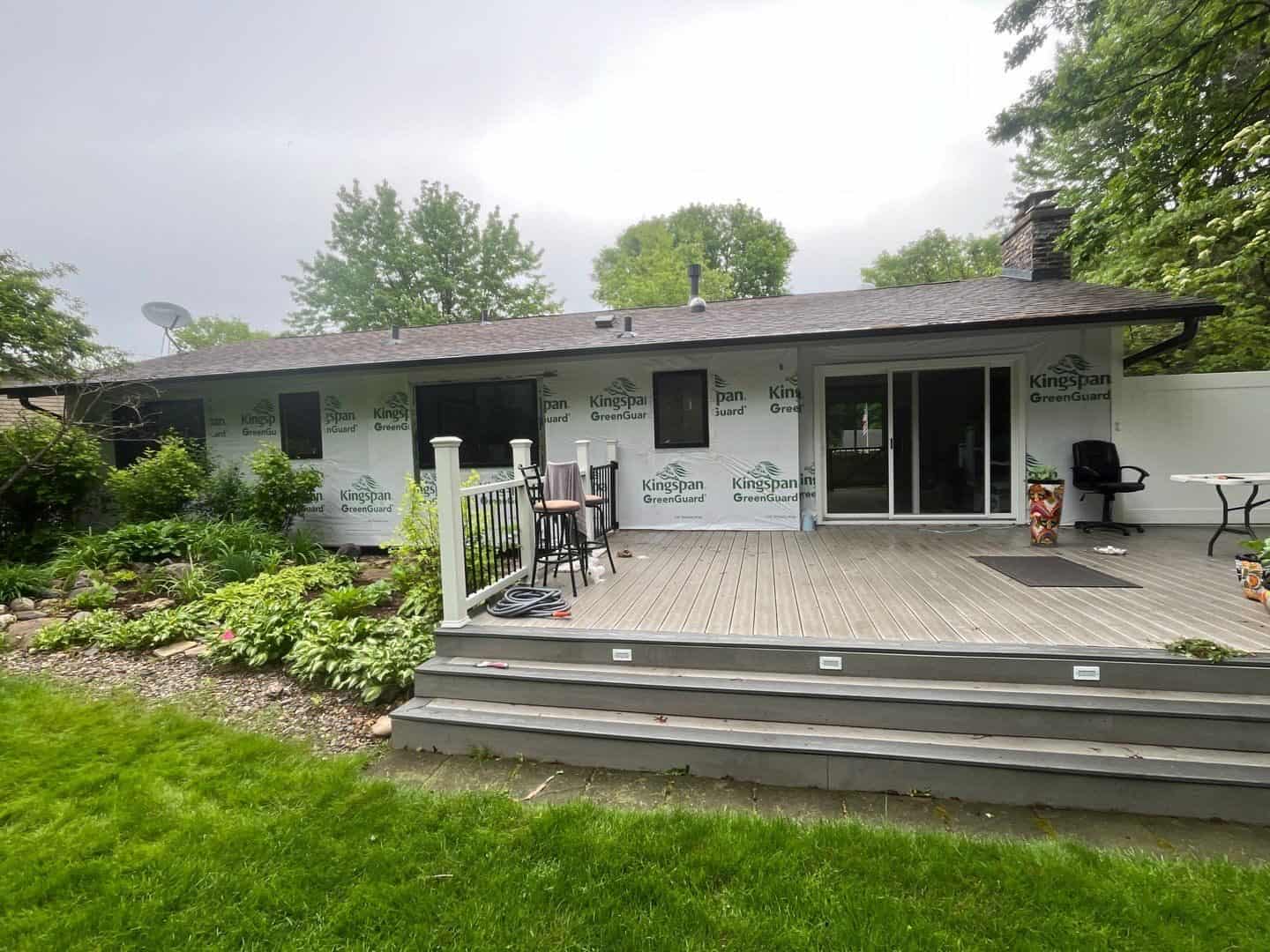 Finished siding and black frame windows on a Burnsville, MN remodel