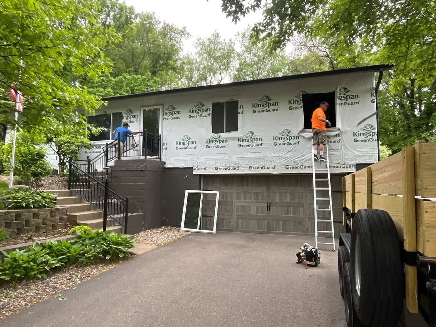 Crew installing soffit and fascia on a Burnsville, MN exterior remodel