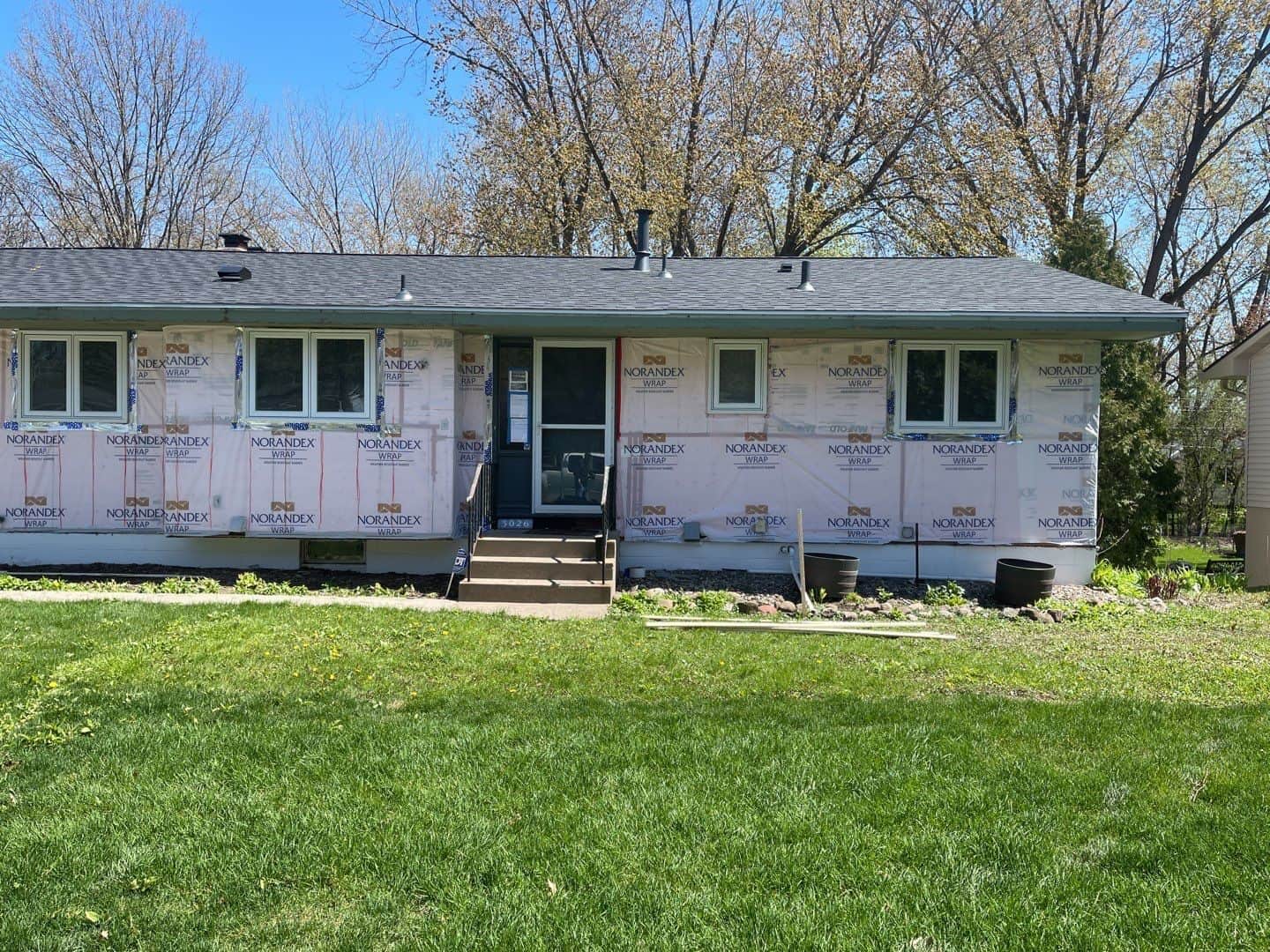 Crystal, MN home wrapped in new housewrap during a siding replacement