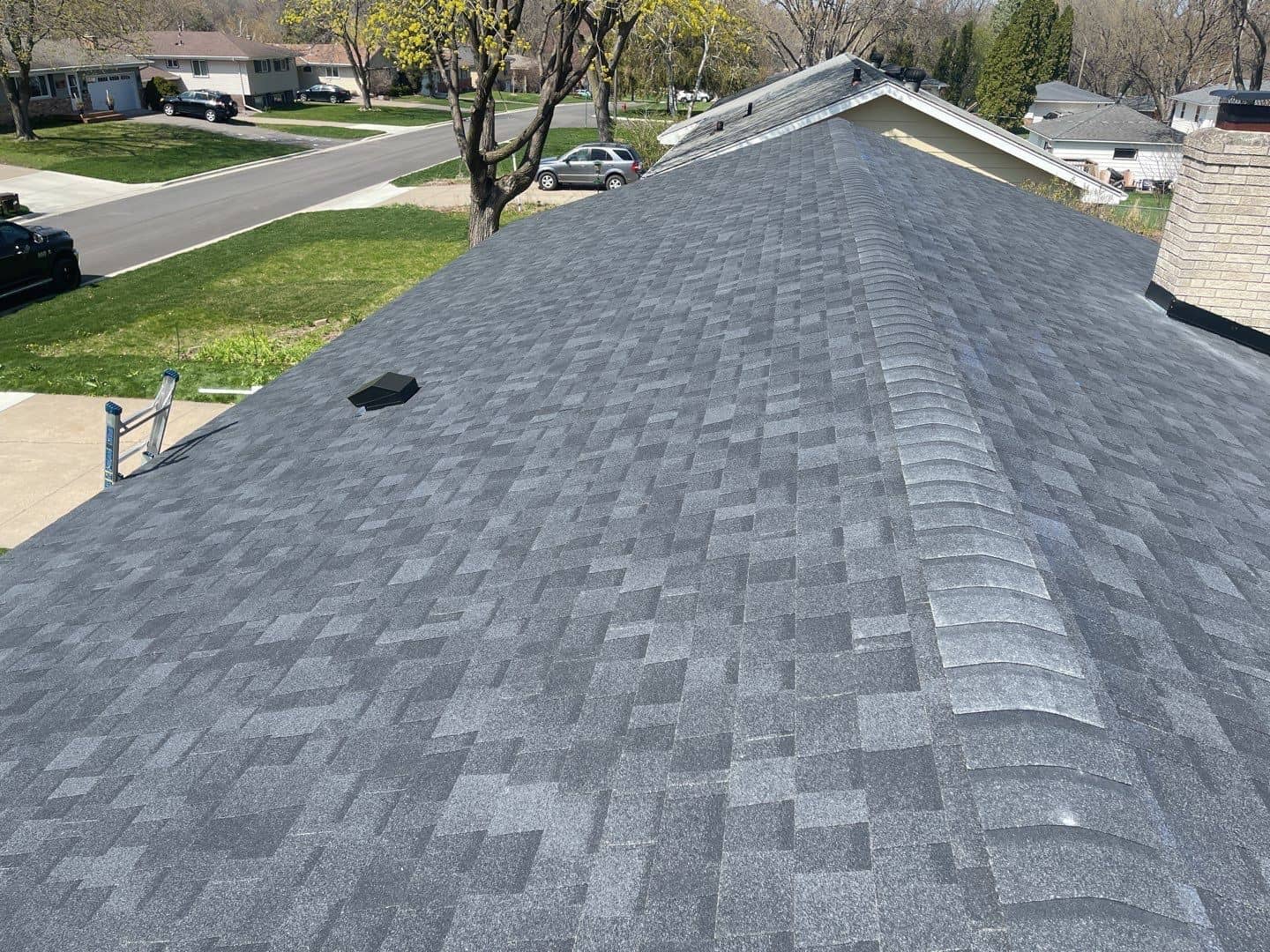 New Owens Corning Duration roof in Onyx Black on a Crystal, MN home
