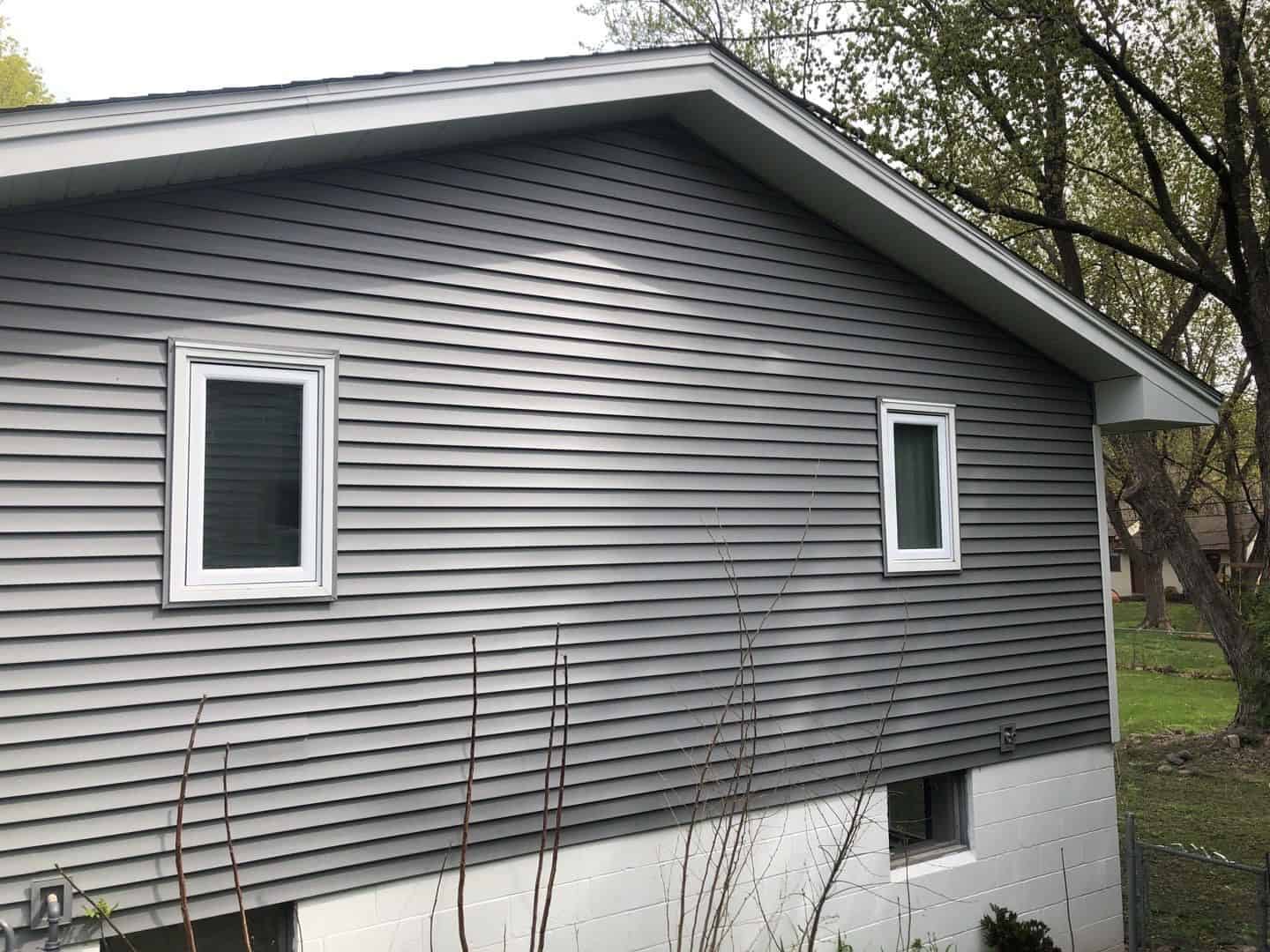 Mastic Carvedwood D4 siding in Deep Granite up close