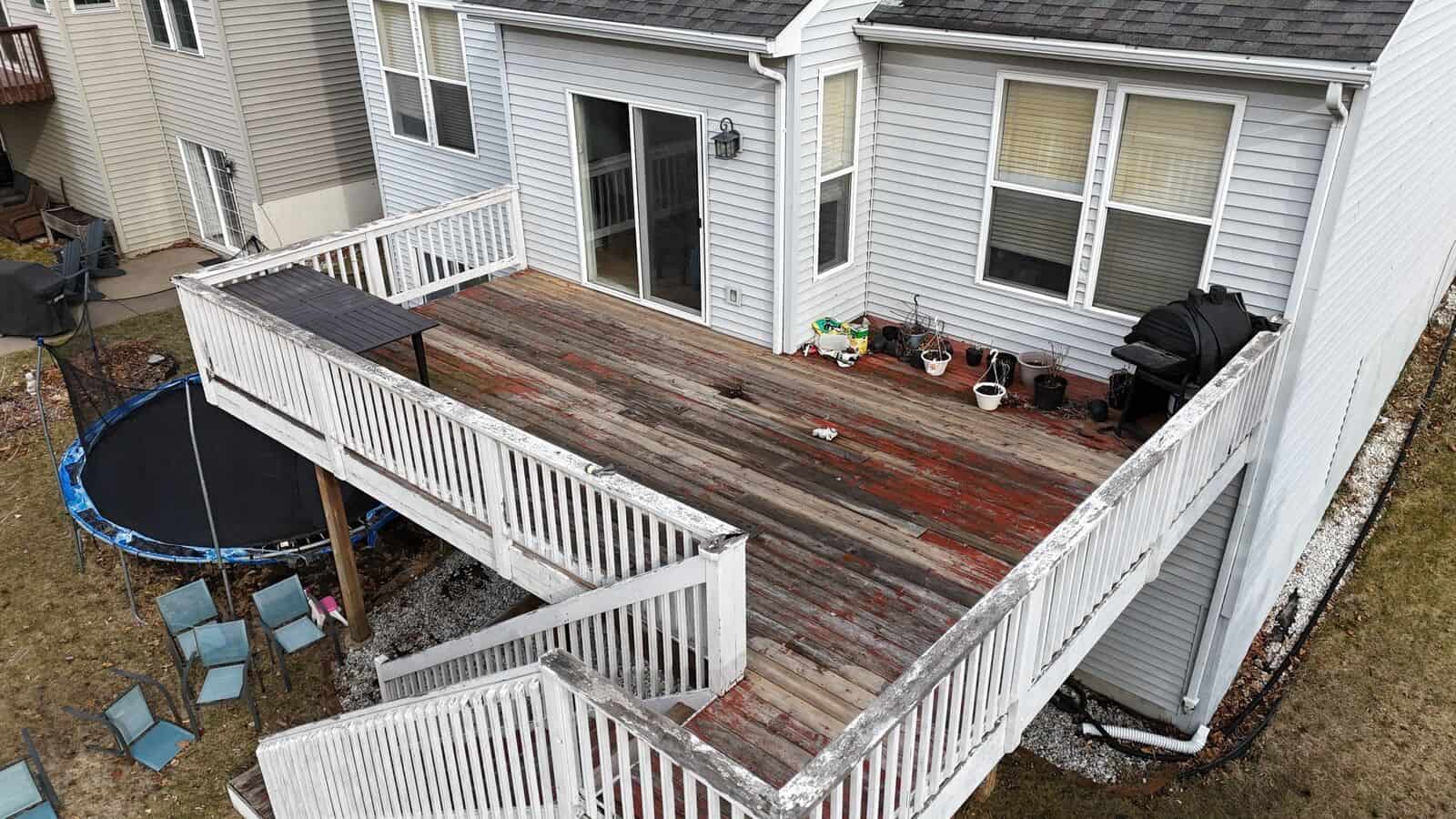 Maple Grove, MN deck with failing boards before the replacement