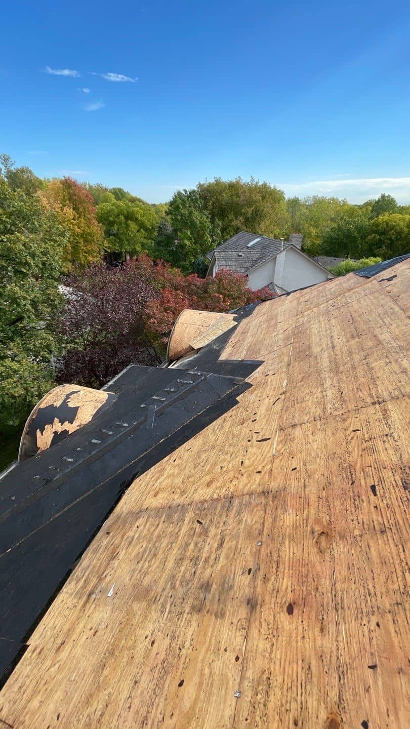 Roof tear-off down to the deck on a Plymouth, MN home