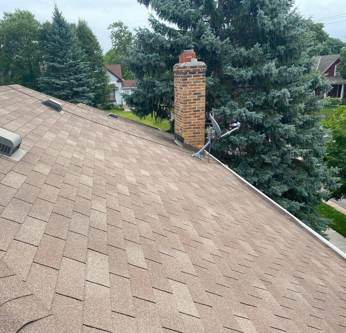 New Owens Corning Duration shingles in Driftwood on a Minneapolis, MN rental