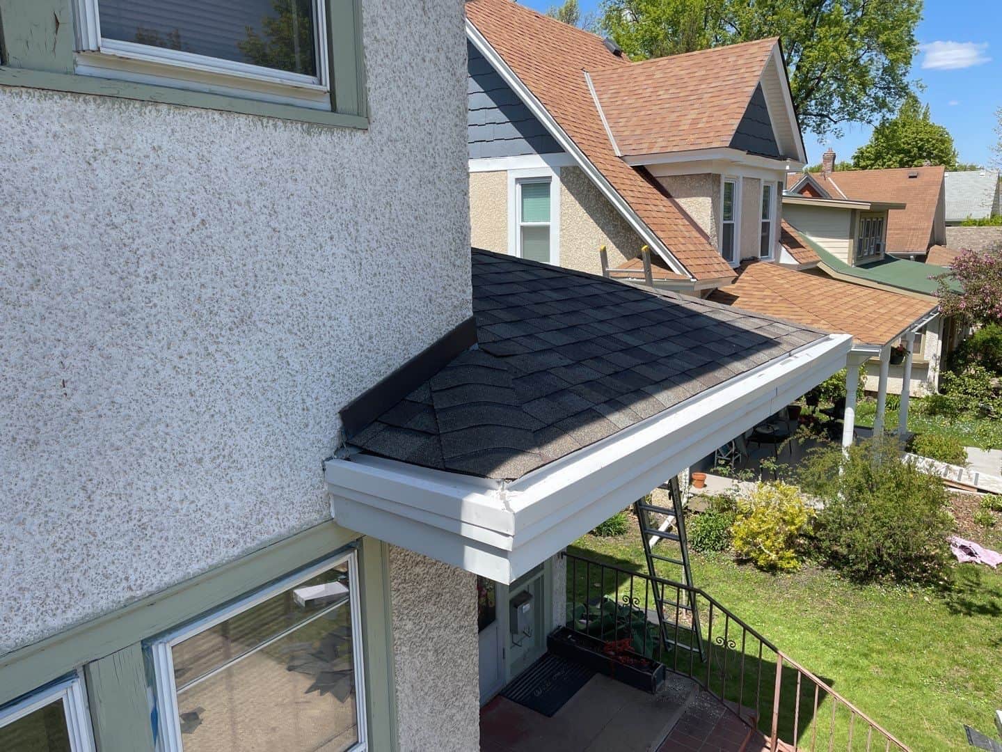 New porch roof and in-roof gutter on a Minneapolis, MN home