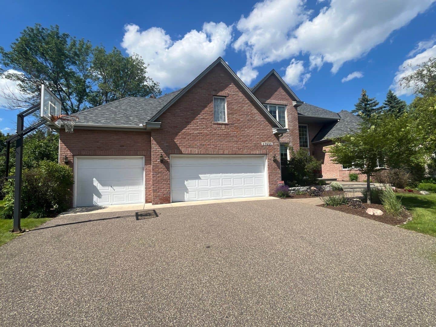 The finished Estate Gray roof from the street in Plymouth, MN