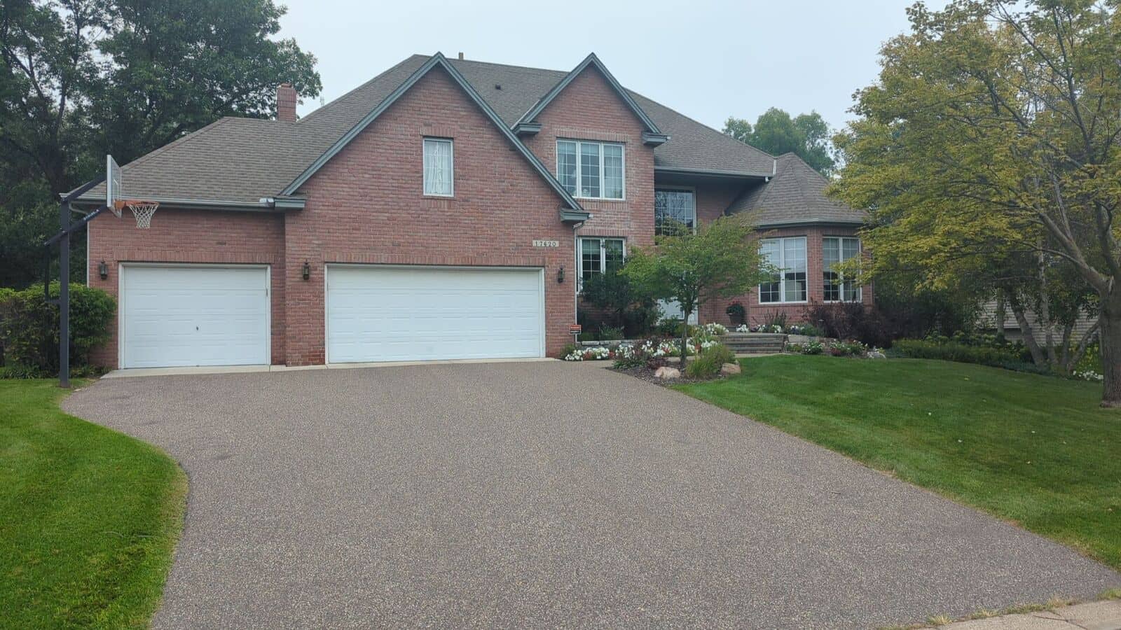 Clean shingle lines over the garage doors in Plymouth, MN