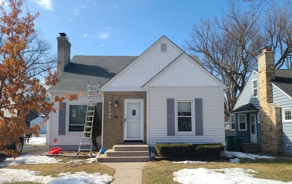 Saint Louis Park, MN home before its roof and gutter replacement