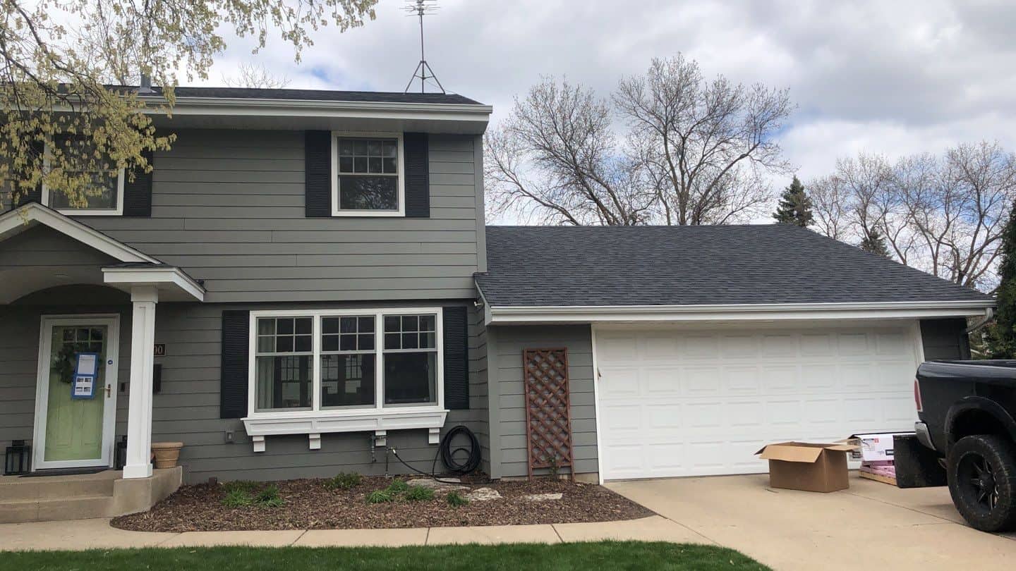 Front of an Edina, MN home after a roof and gutter replacement