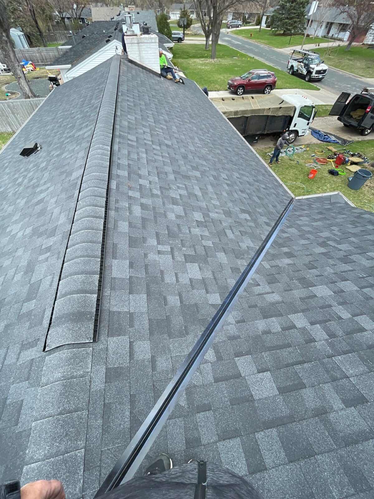 Ridge vent detail on a new Owens Corning Duration roof in Onyx Black in Minneapolis, MN