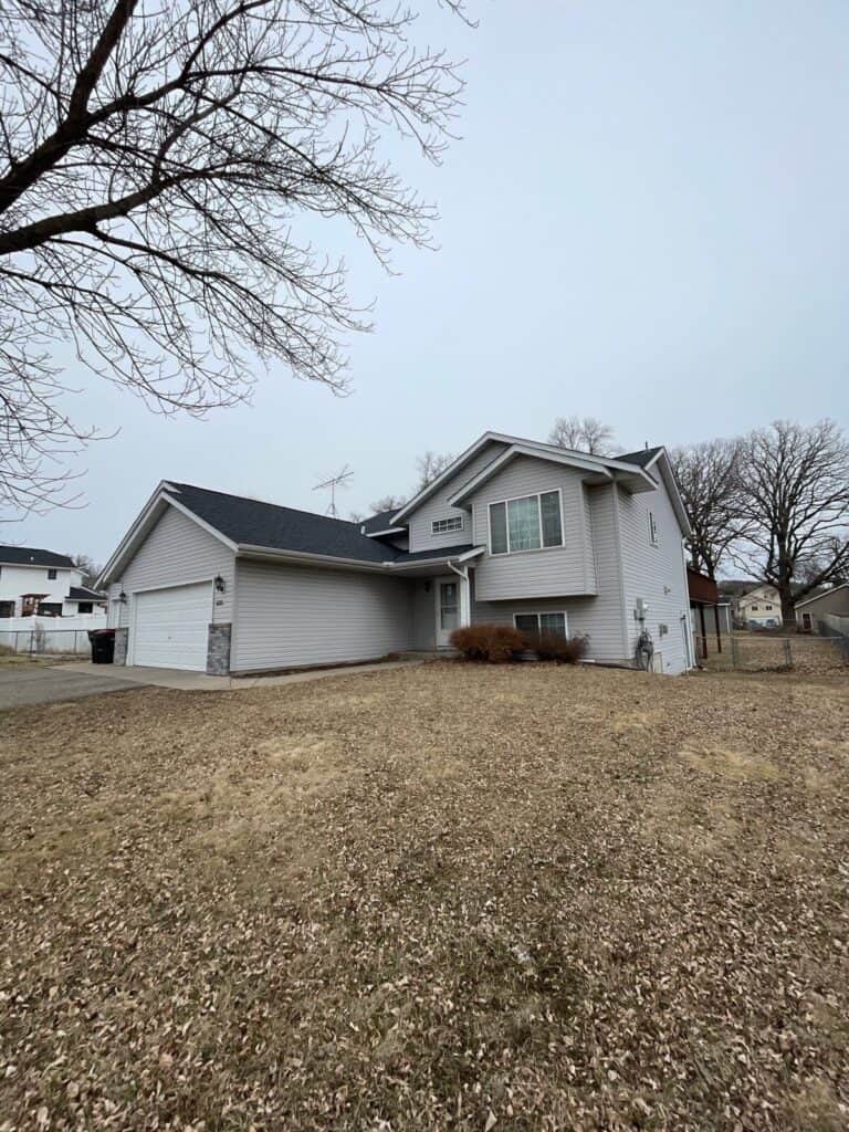 Monticello, MN rental property with a new Owens Corning Duration roof in Onyx Black