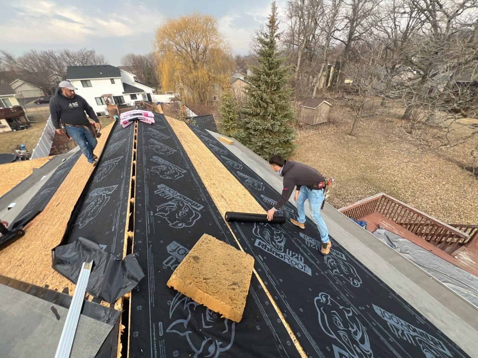 Roof tear-off in progress on a Monticello, MN rental property