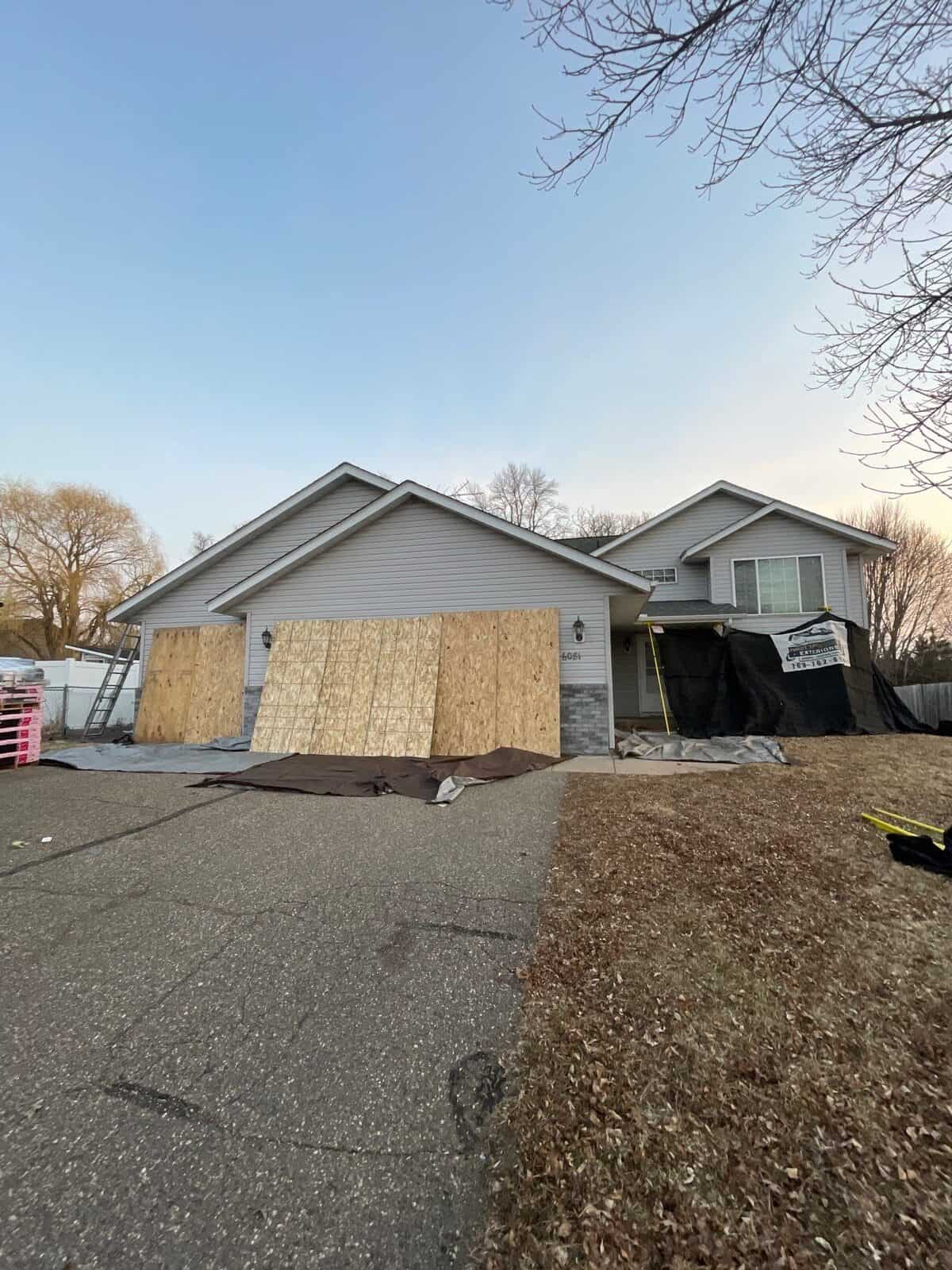 Garage protected during a Monticello, MN roof replacement