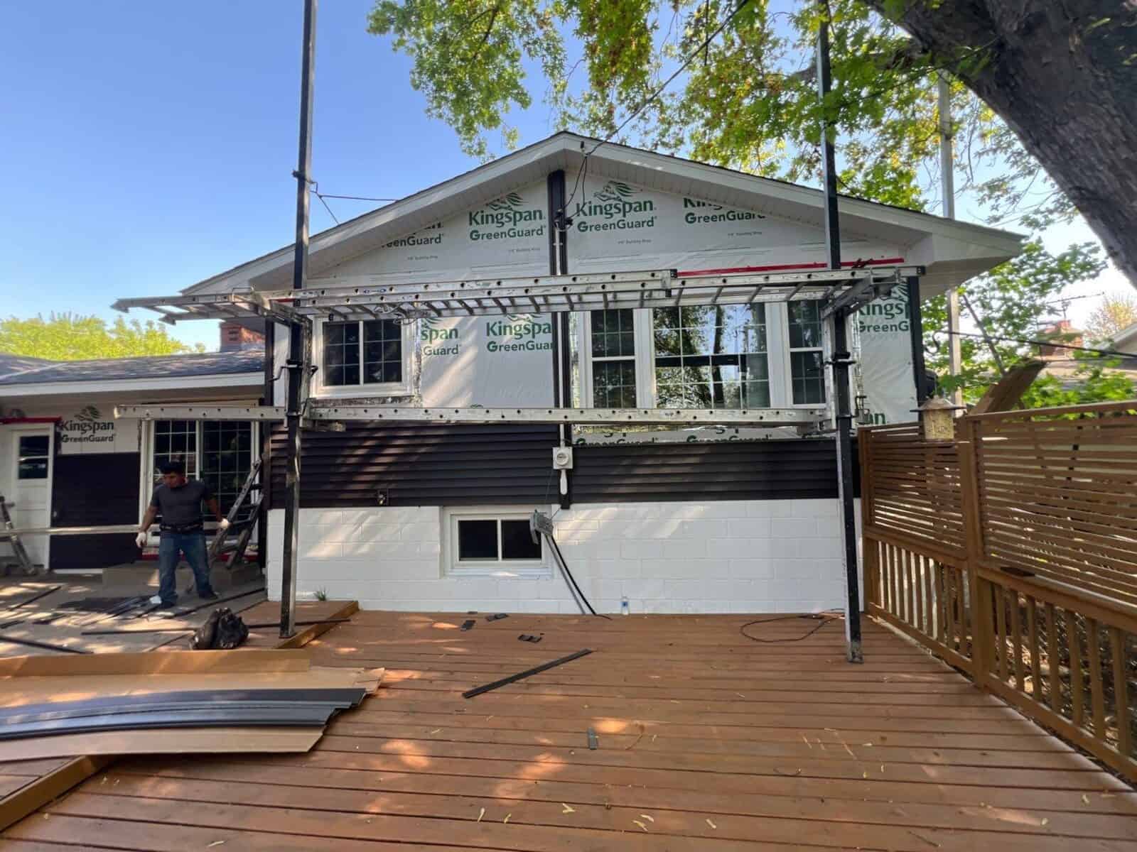 Siding installation in progress on a New Hope, MN home