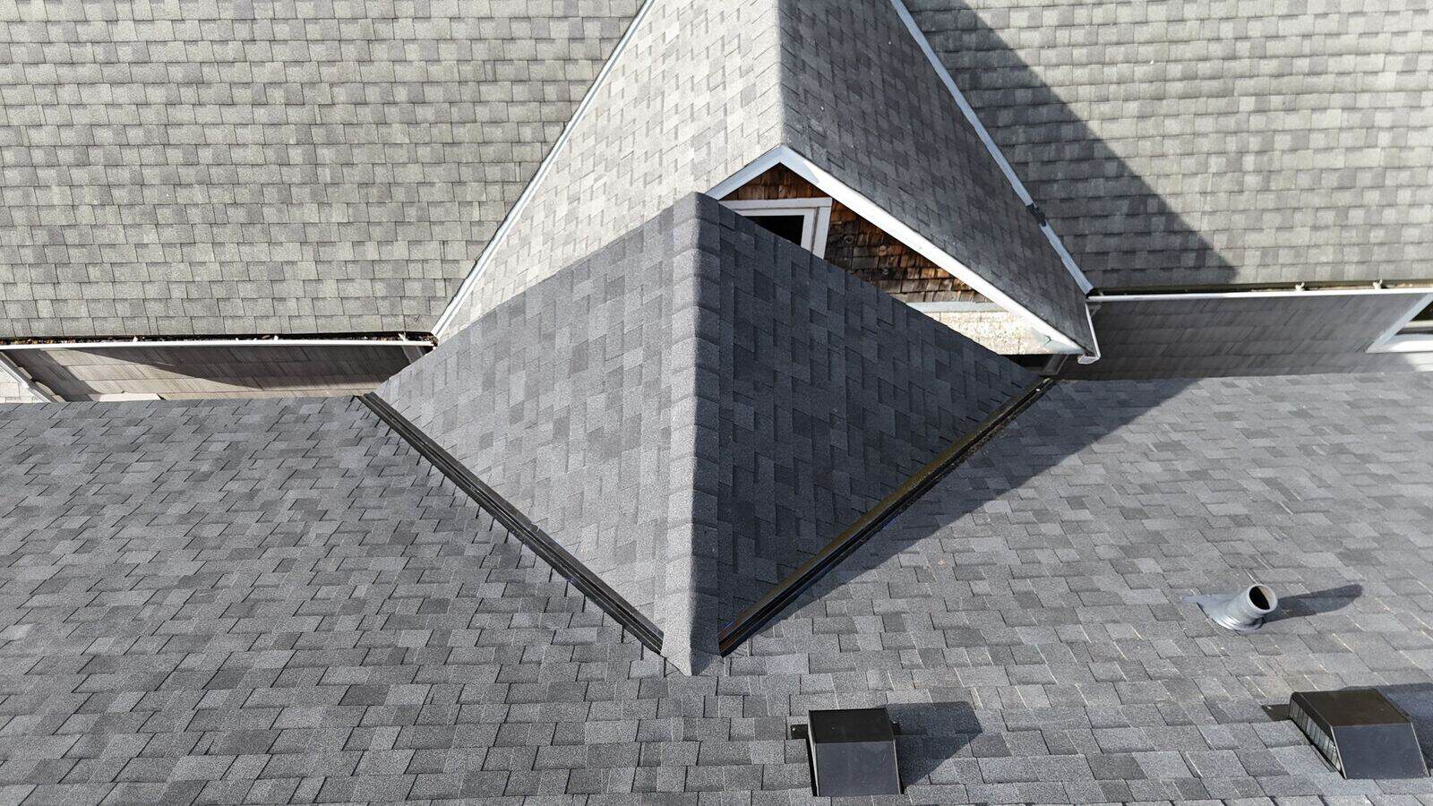 Dormer detail on a new Onyx Black roof in St. Paul, MN