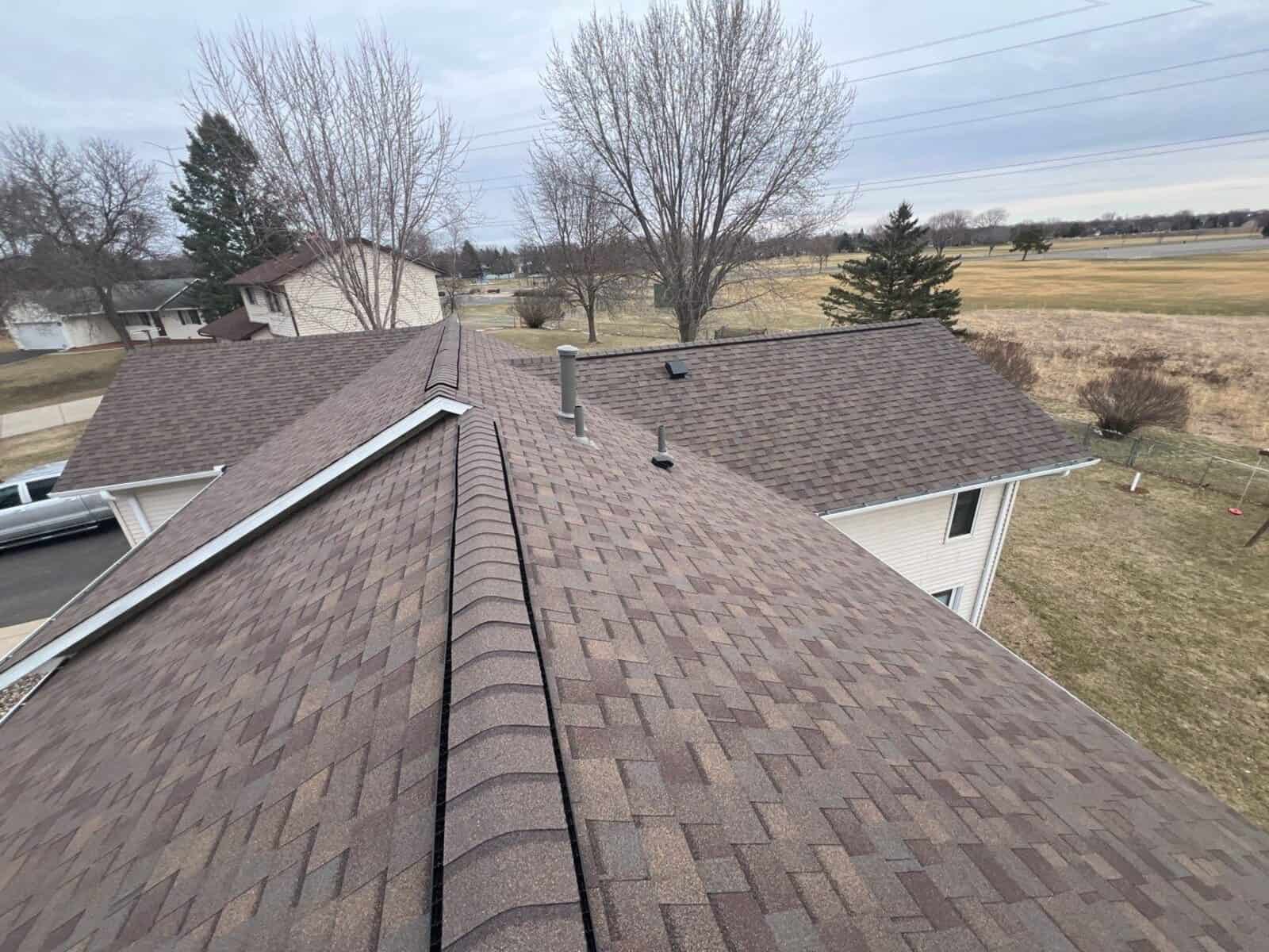 Ridge of a new Teak roof in Cottage Grove, MN