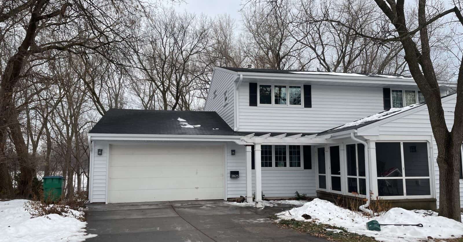 Minneapolis, MN home with new Glacier White steel siding in winter