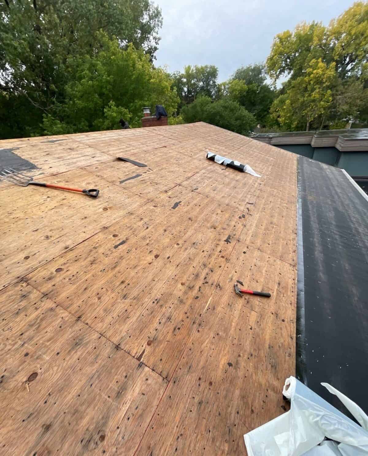 Roof tear-off down to the deck on a Minneapolis, MN home
