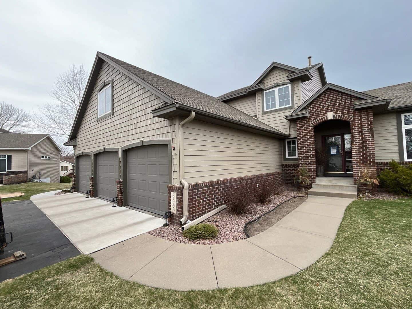 St. Michael, MN home before its insurance-approved siding replacement