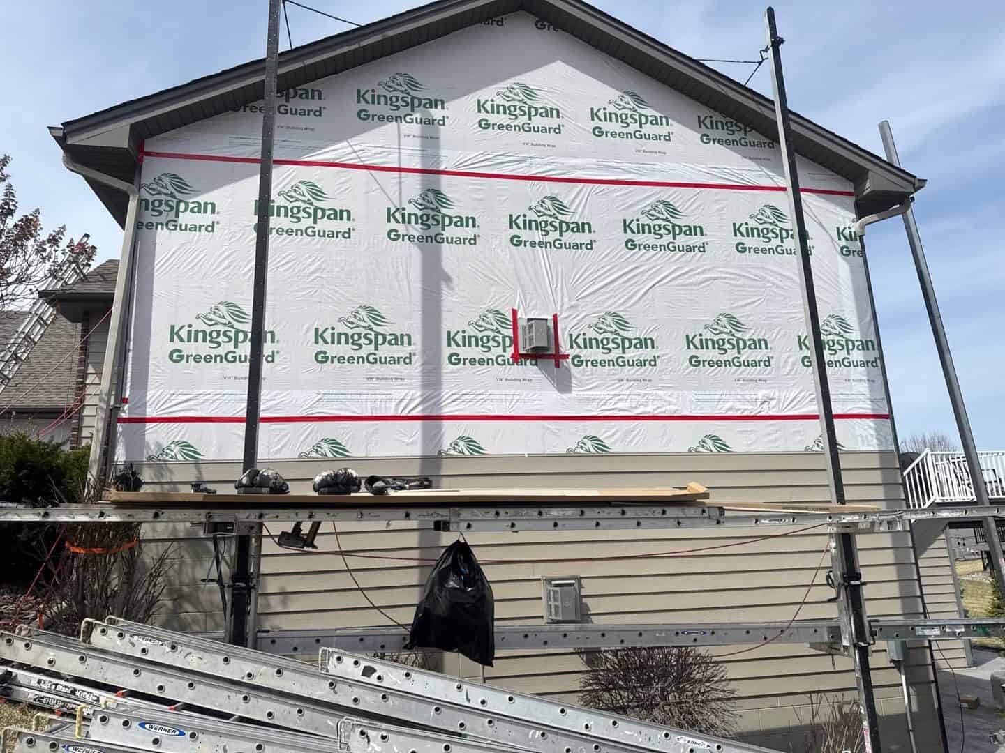 St. Michael, MN home wrapped in housewrap during a siding replacement