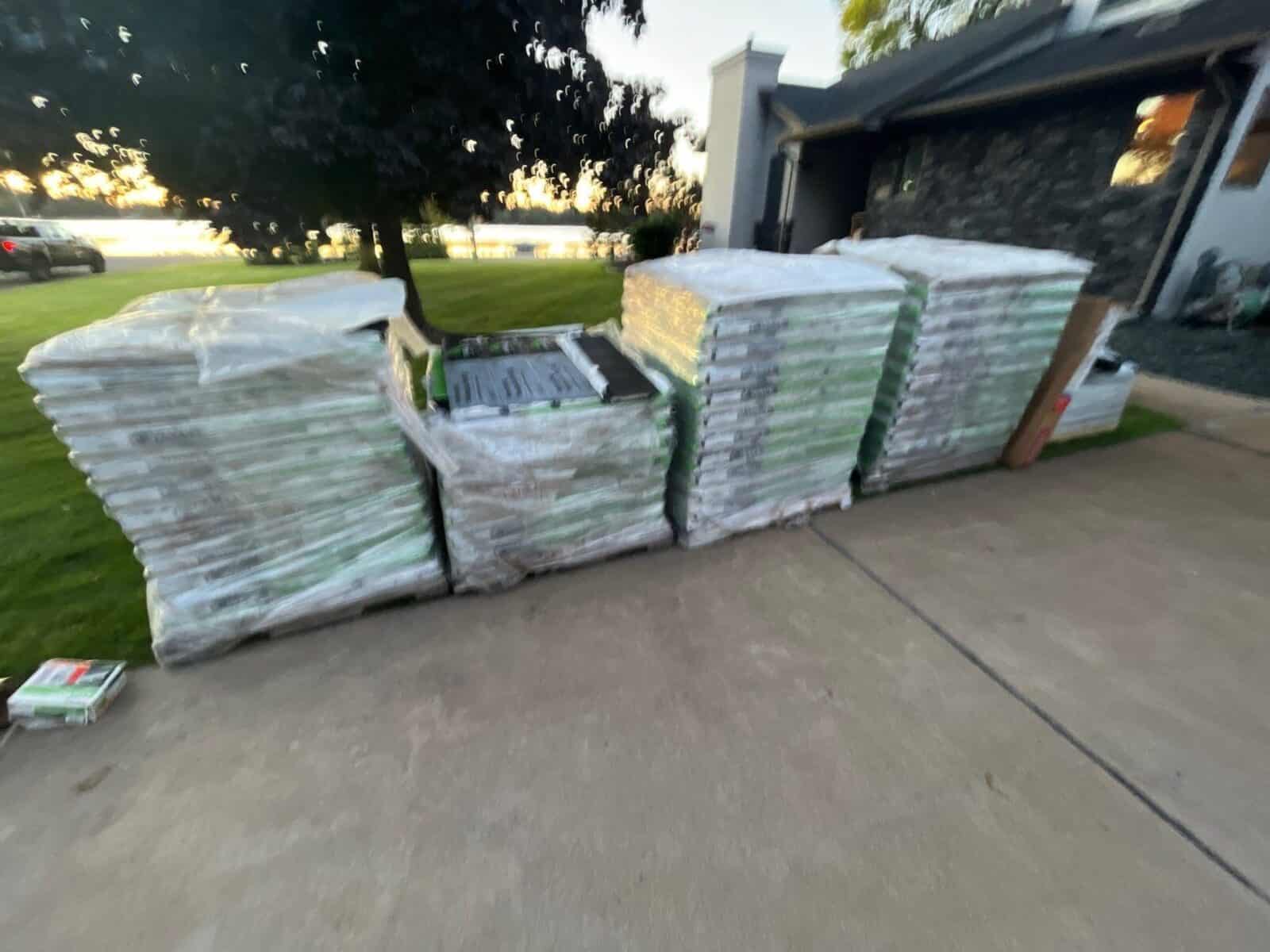 F-Wave roofing materials staged on a driveway in Little Canada, MN