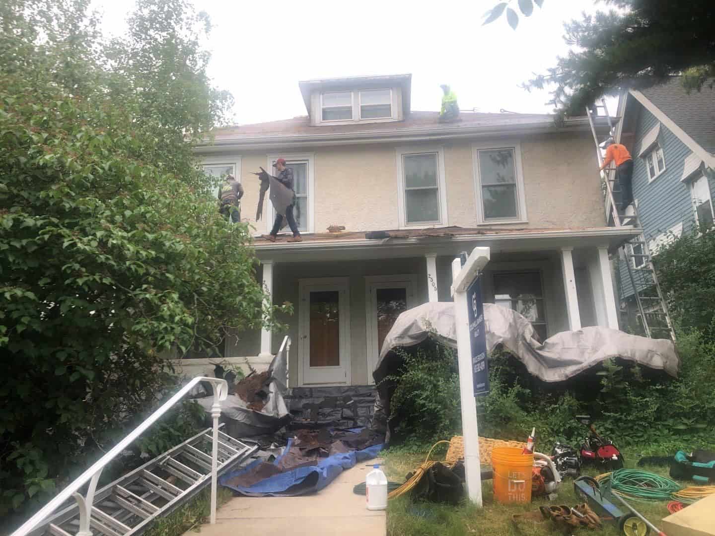 The crew replacing the roof on a Minneapolis, MN home