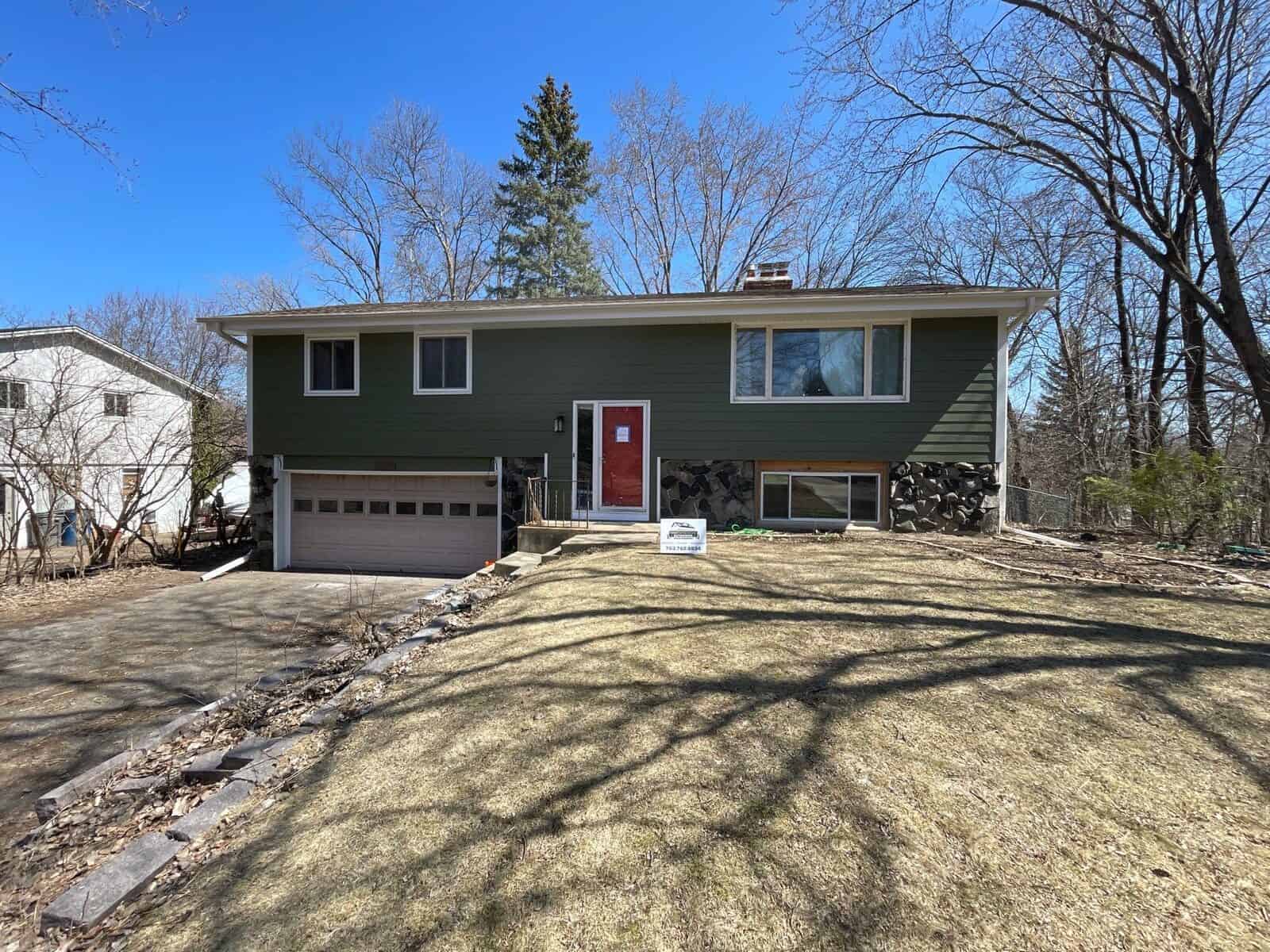 Front elevation of a Plymouth, MN home with new Mountain Sage fiber cement siding and Polar White trim