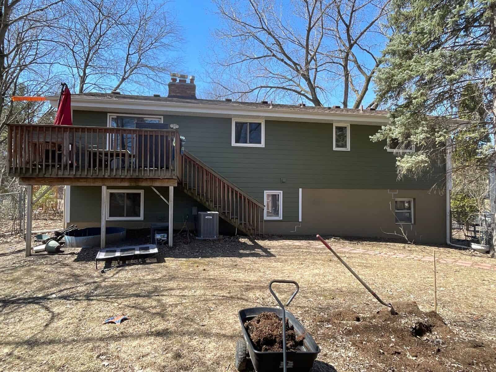 New James Hardie siding and Edco soffit around the rear deck of a Plymouth, MN home