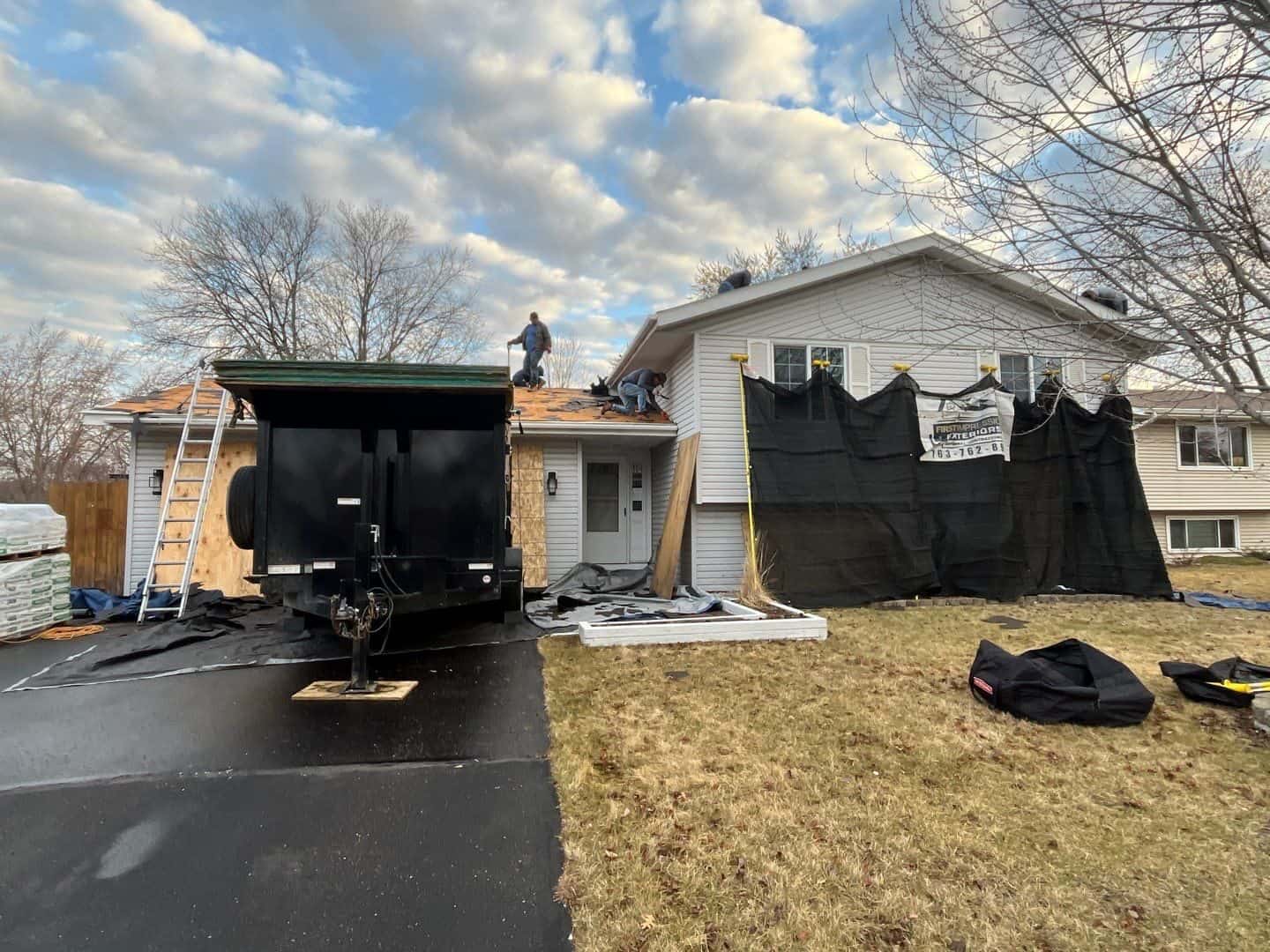 Brooklyn Park, MN home protected with tarps during the tear-off