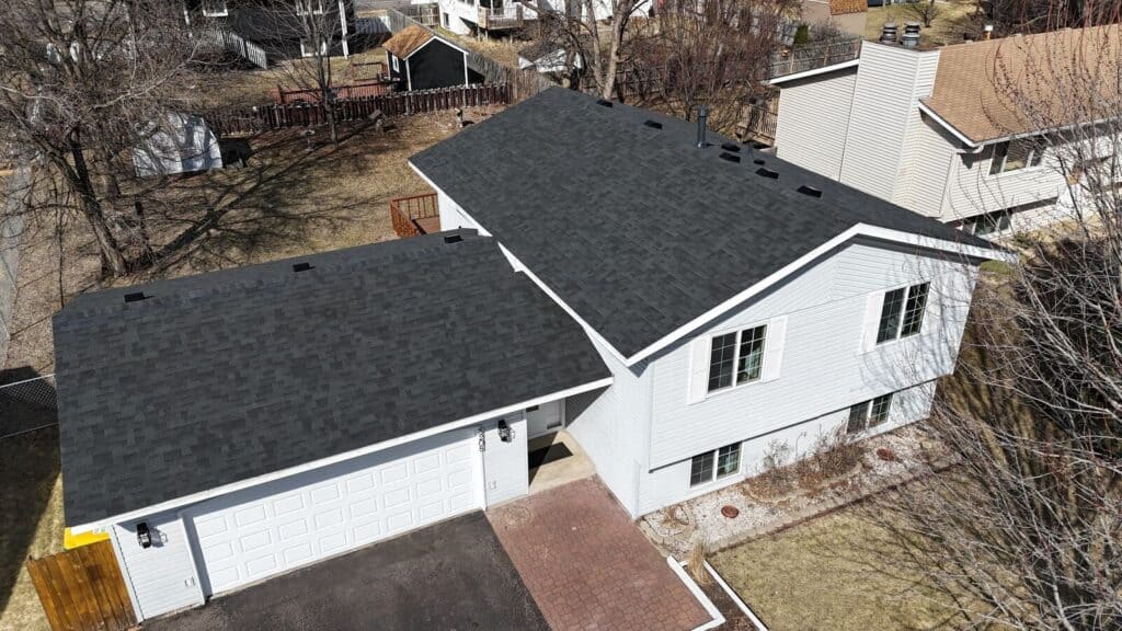 Brooklyn Park, MN rental home with a new Malarkey Highlander roof in Brilliant Black