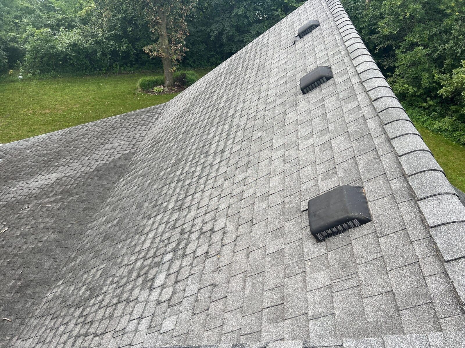 Ridge of a new Moire Black roof in Annandale, MN