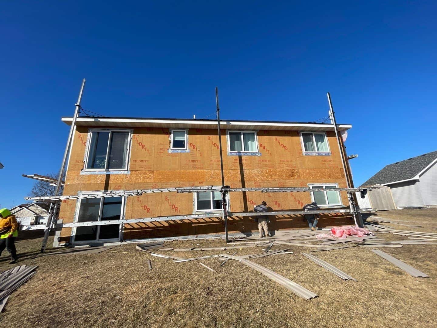 A Big Lake, MN home stripped to the sheathing during a siding replacement