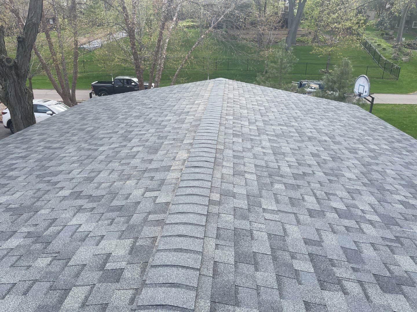 Minnetonka, MN home after a hail damage roof replacement with Owens Corning Duration shingles in Estate Gray