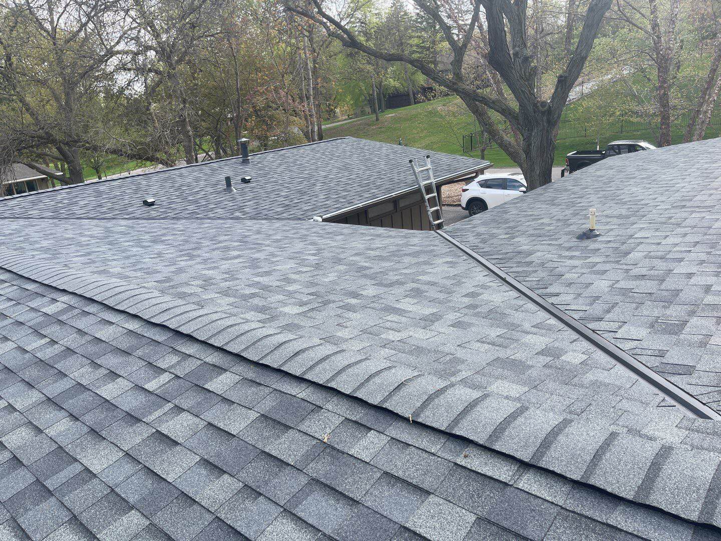 Finished Owens Corning Duration Estate Gray shingle roof on a Minnetonka, MN home