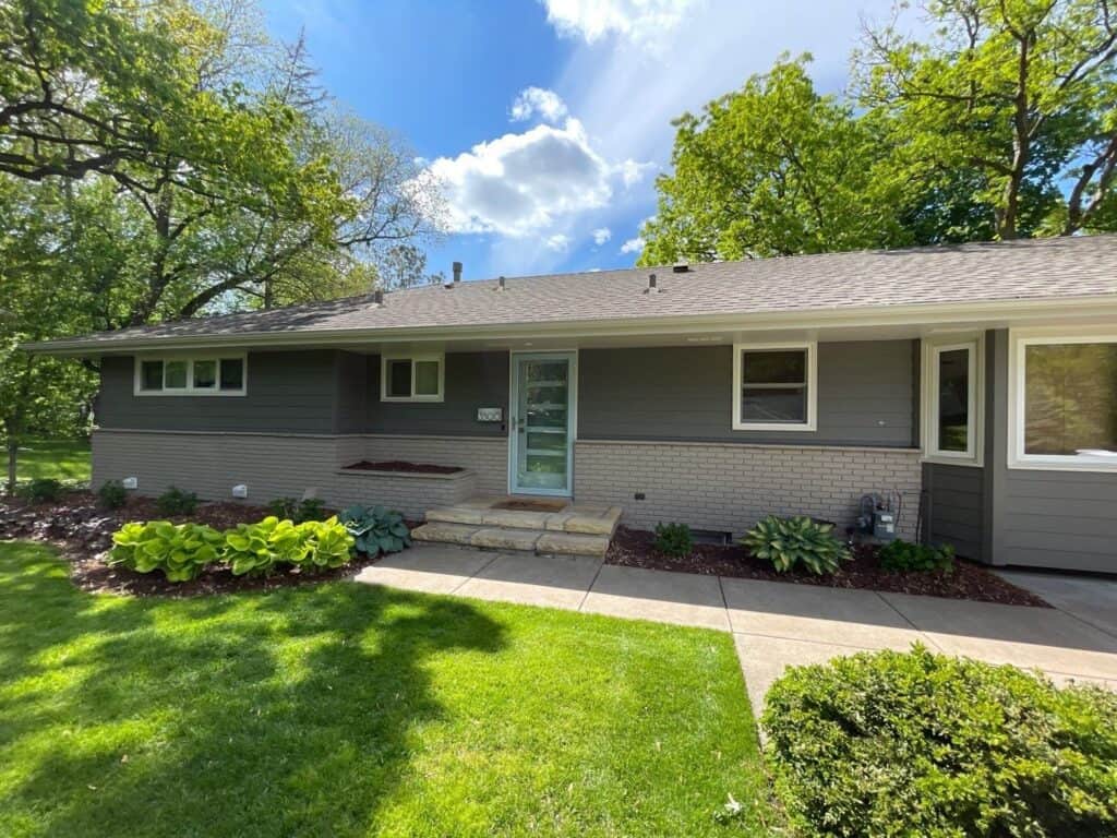 Front of a Hopkins, MN home with new LP SmartSide ExpertFinish siding in Tundra Gray