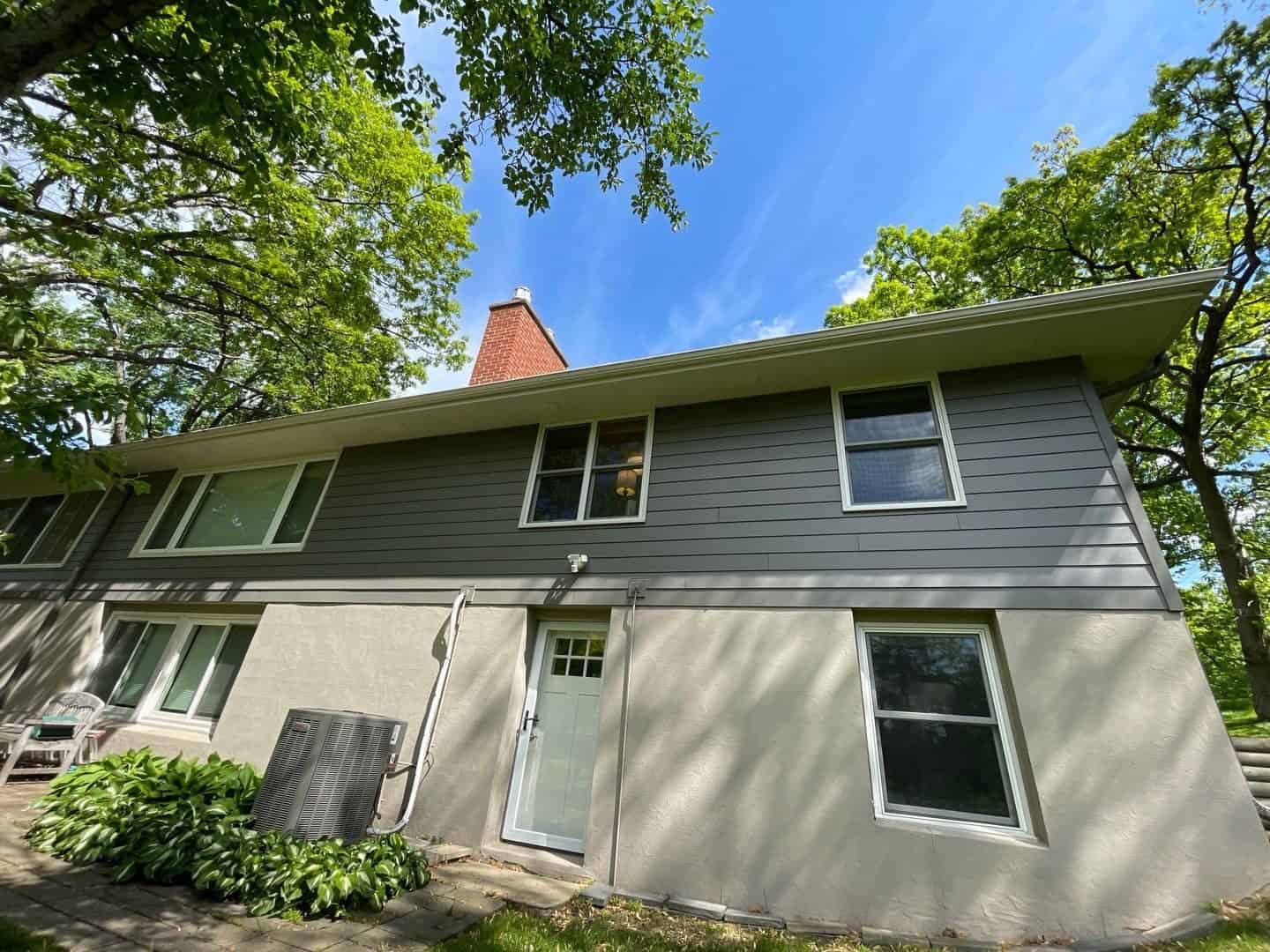 Side view of new Tundra Gray siding and brick on a Hopkins, MN home