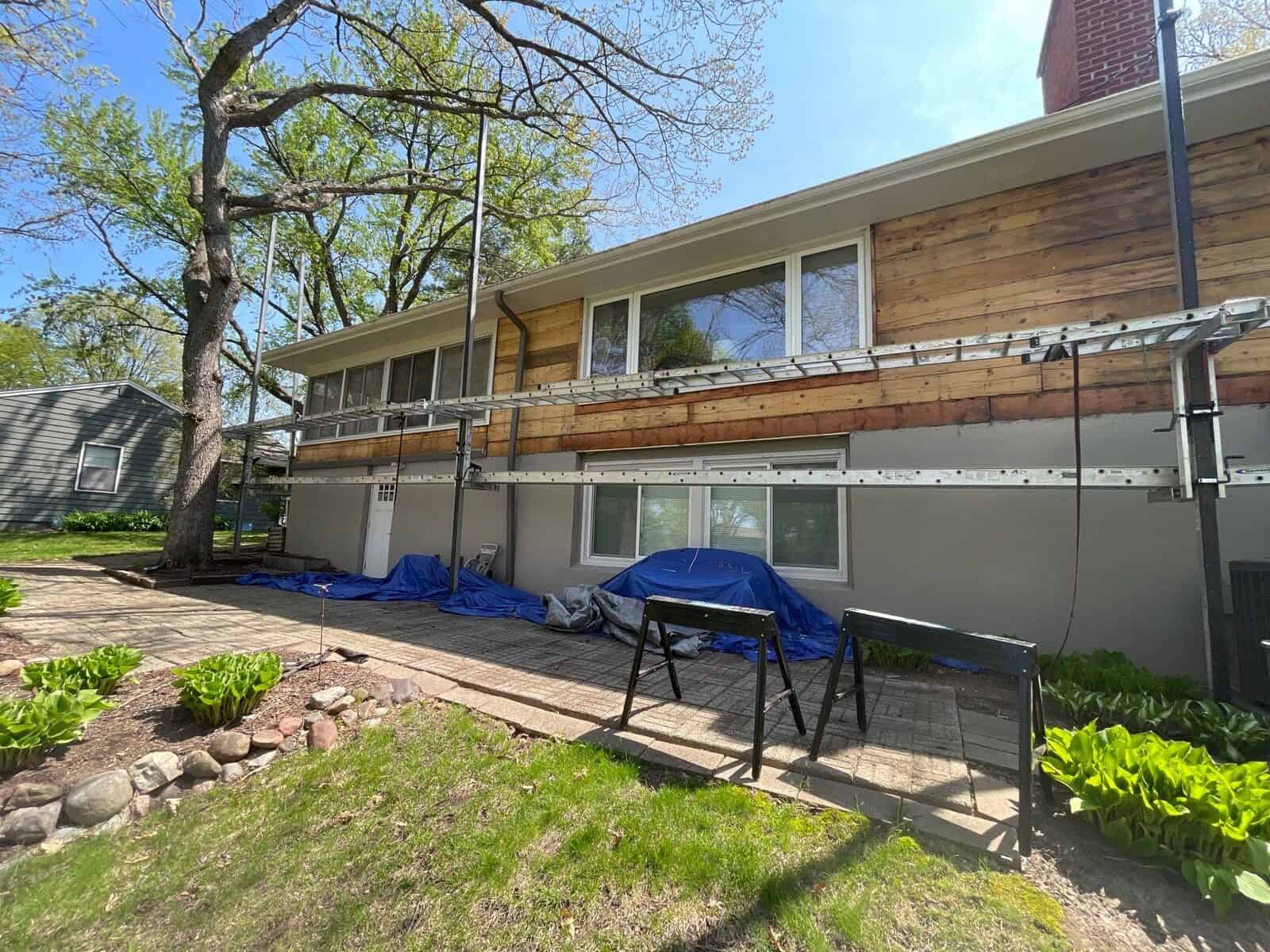 LP SmartSide siding installation in progress on a Hopkins, MN home
