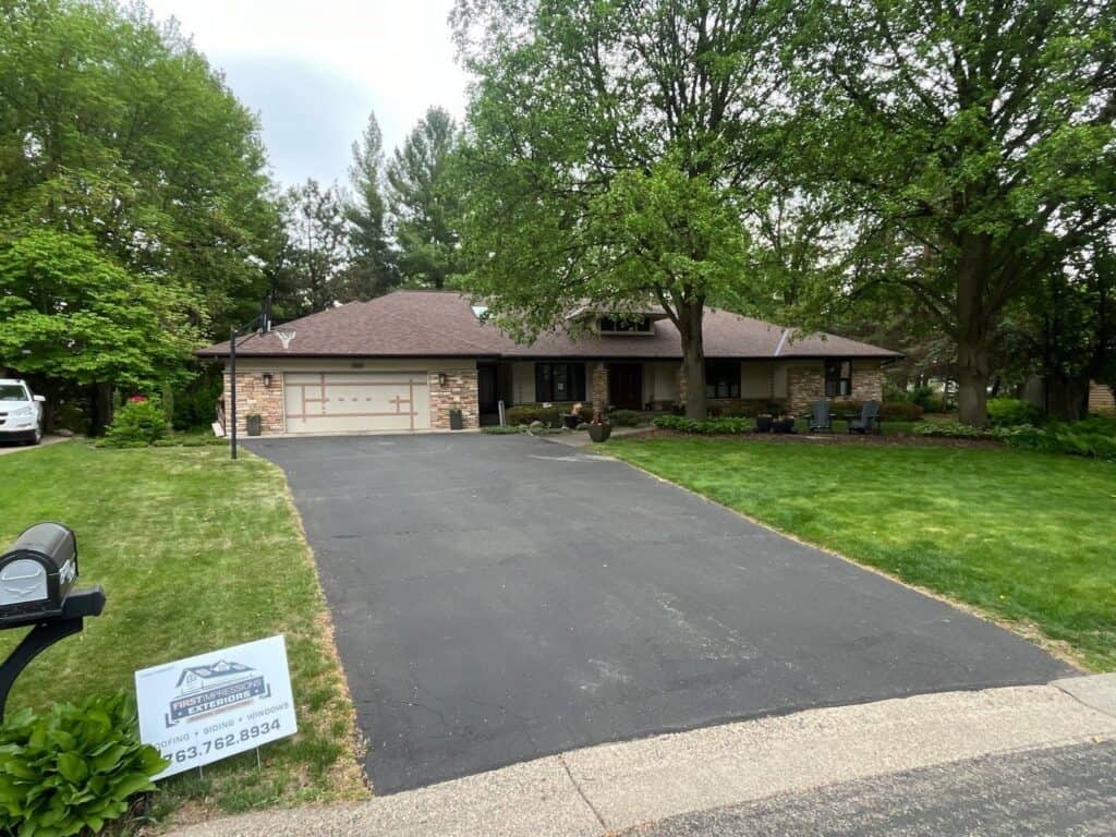 Bloomington, MN home after a roof replacement with Malarkey Vista shingles in Antique Brown