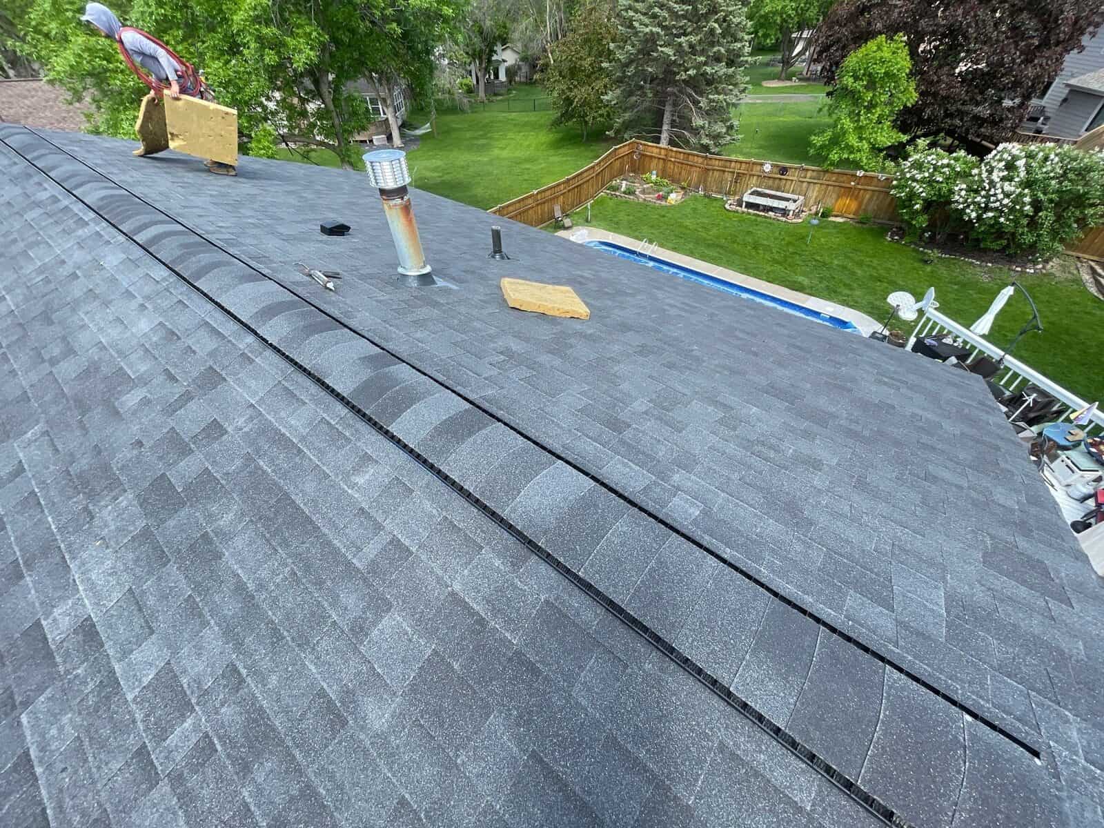 Wide view of a finished Malarkey Vista Brilliant Black roof in Plymouth, MN
