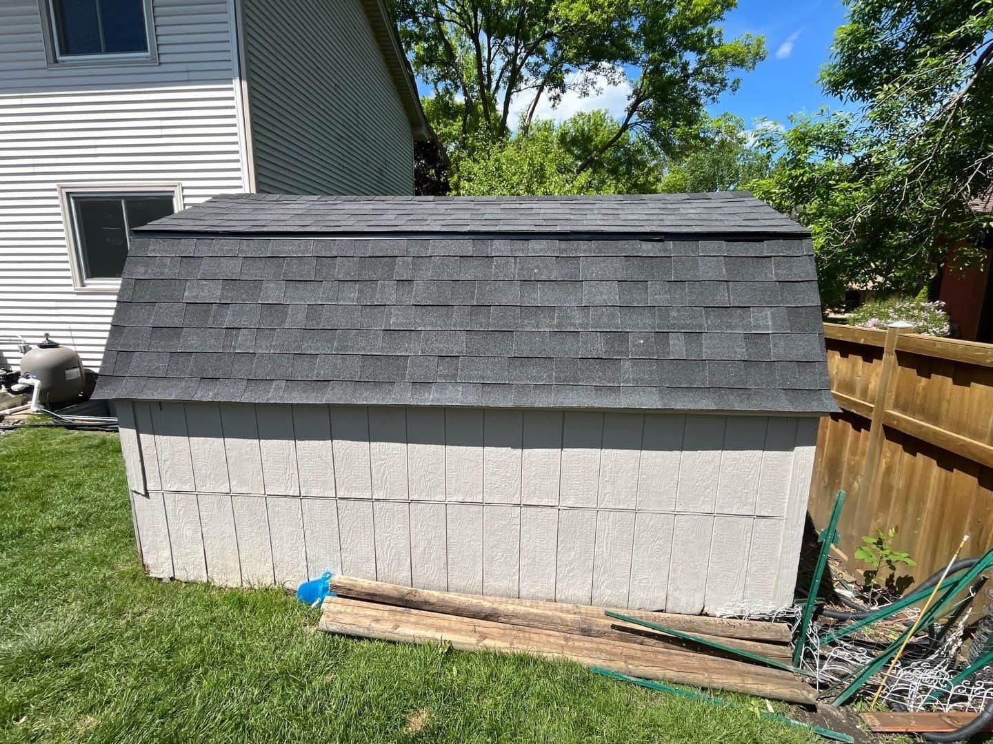 Matching shed roof replaced during a Plymouth, MN roofing project