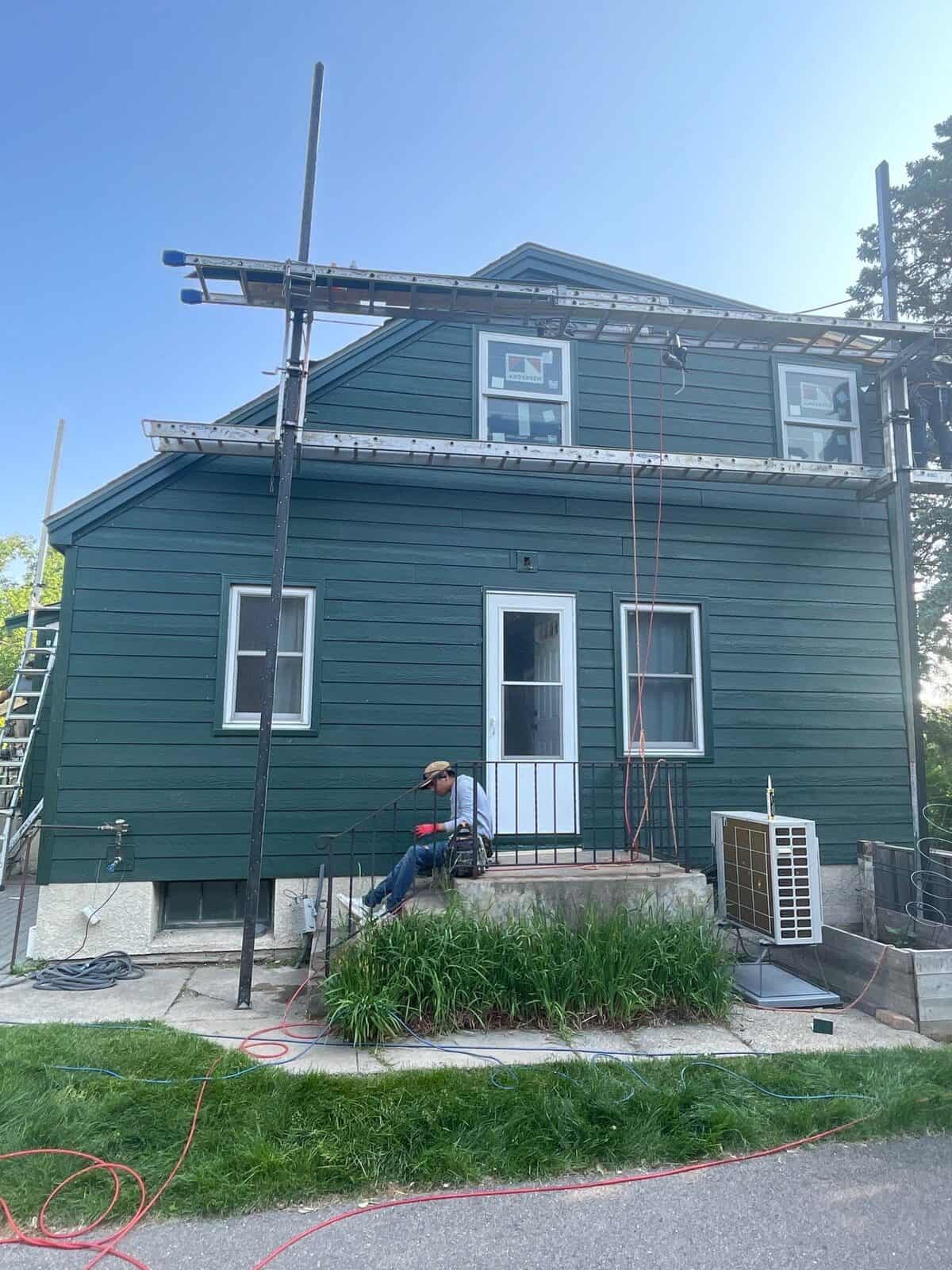 New dark green LP SmartSide siding on a St. Louis Park, MN home