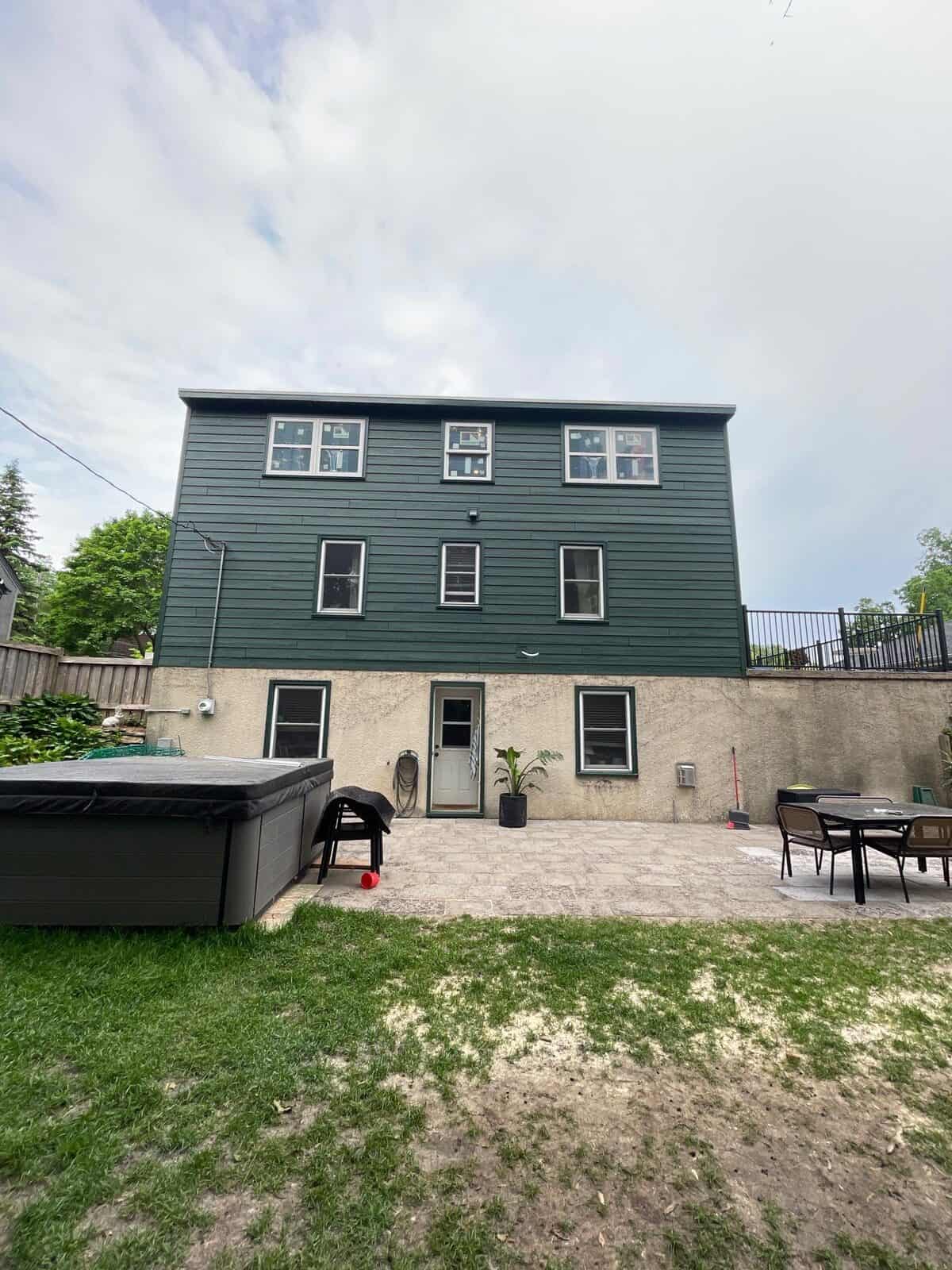 Rear patio and new siding on a St. Louis Park, MN remodel