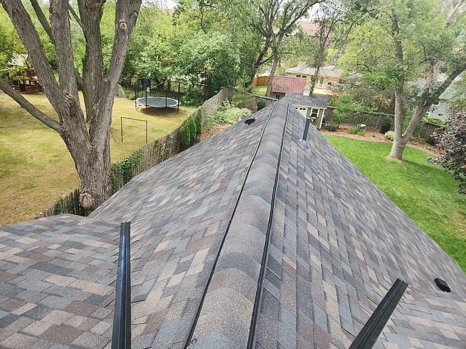 Finished Owens Corning Duration Black Sable shingle roof on a Golden Valley, MN home